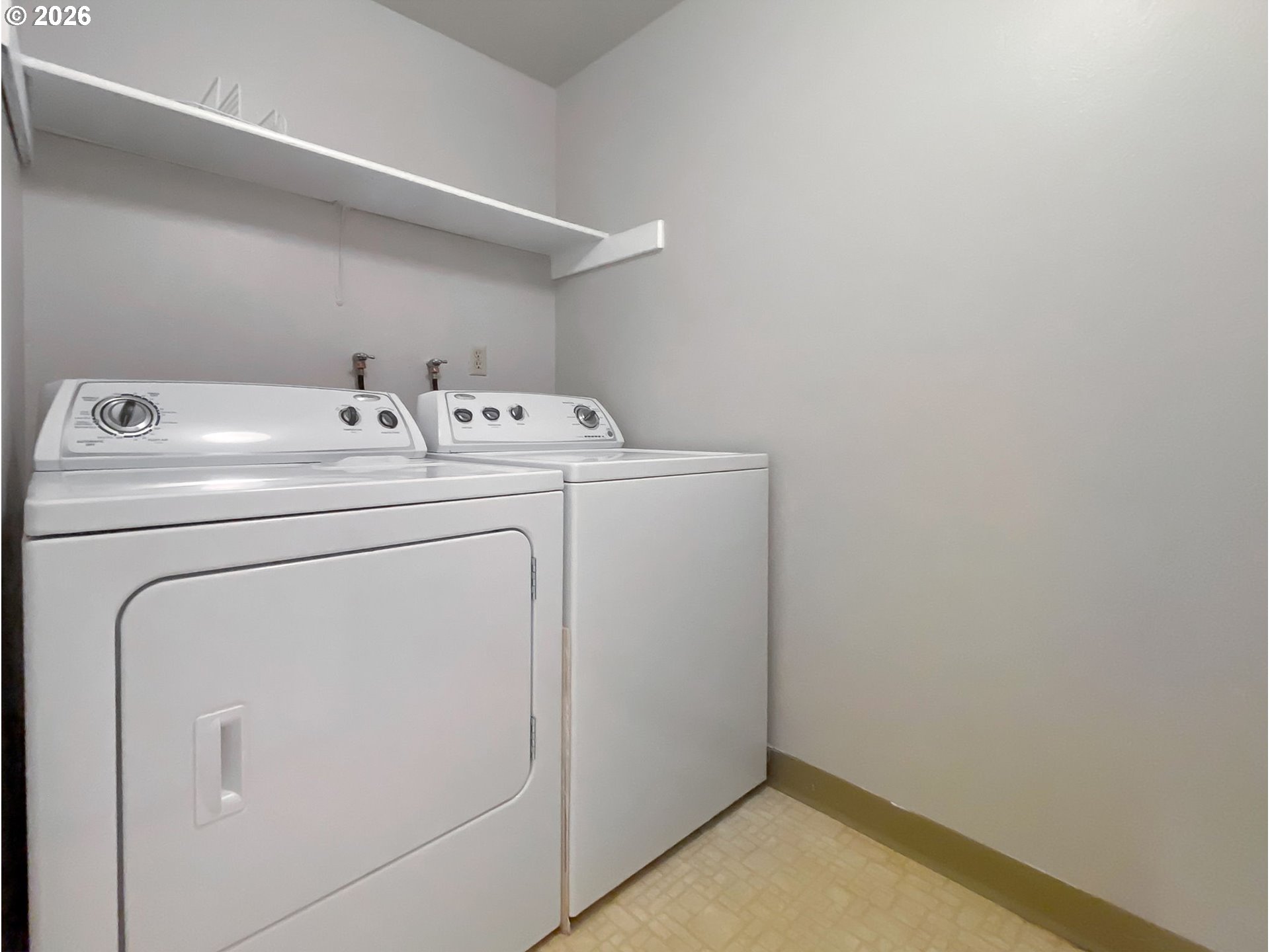 14720 Southwest Grayling Lane Beaverton, OR 97007 - Photo 29 of 32 a utility room with dryer and washer