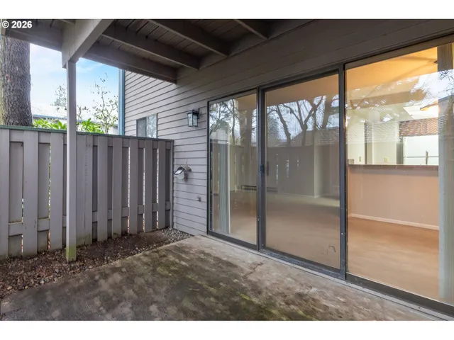 a bathroom with a glass door