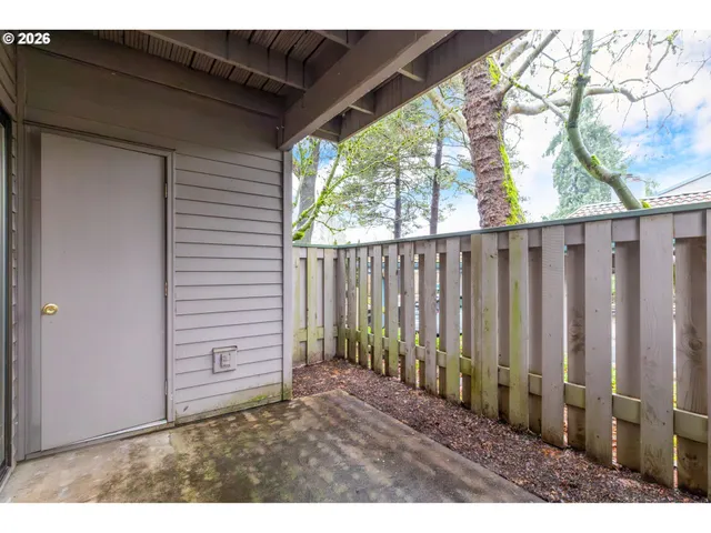 a view of backyard with green space