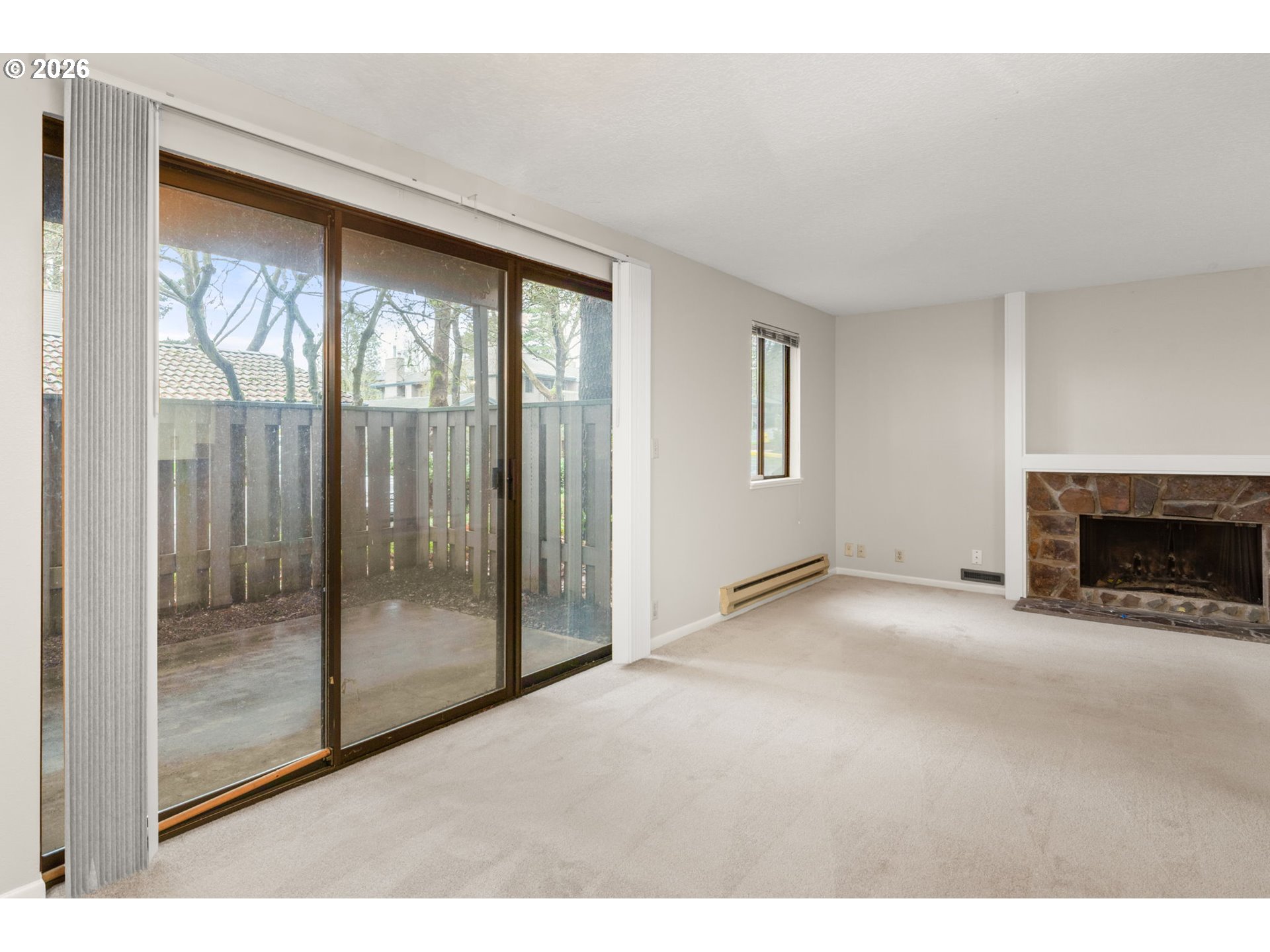 14720 Southwest Grayling Lane Beaverton, OR 97007 - Photo 7 of 32 a view of an empty room with a window