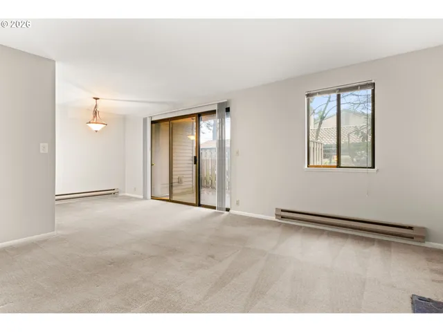 a view of an empty room with window