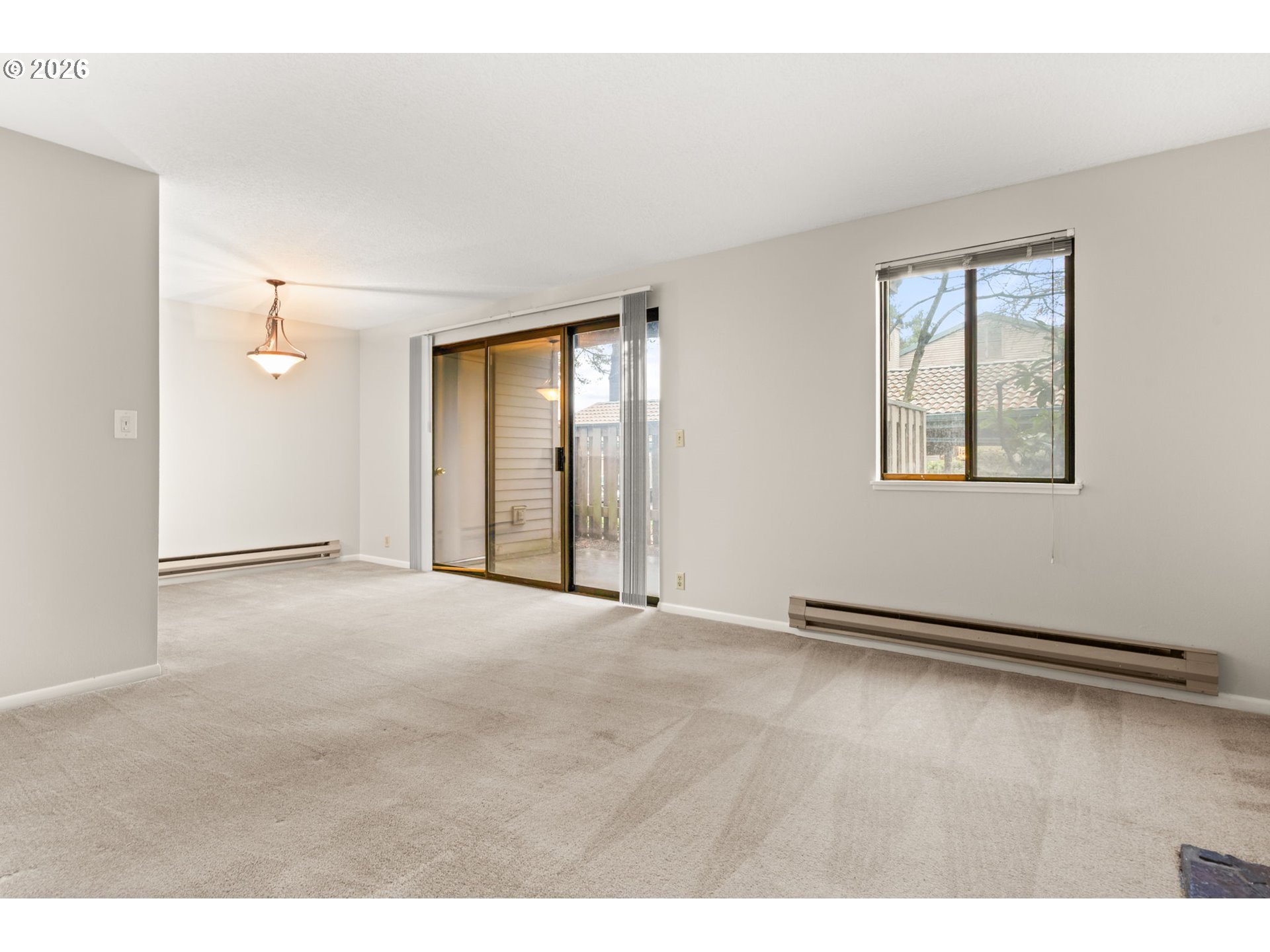 14720 Southwest Grayling Lane Beaverton, OR 97007 - Photo 10 of 32 a view of an empty room with window