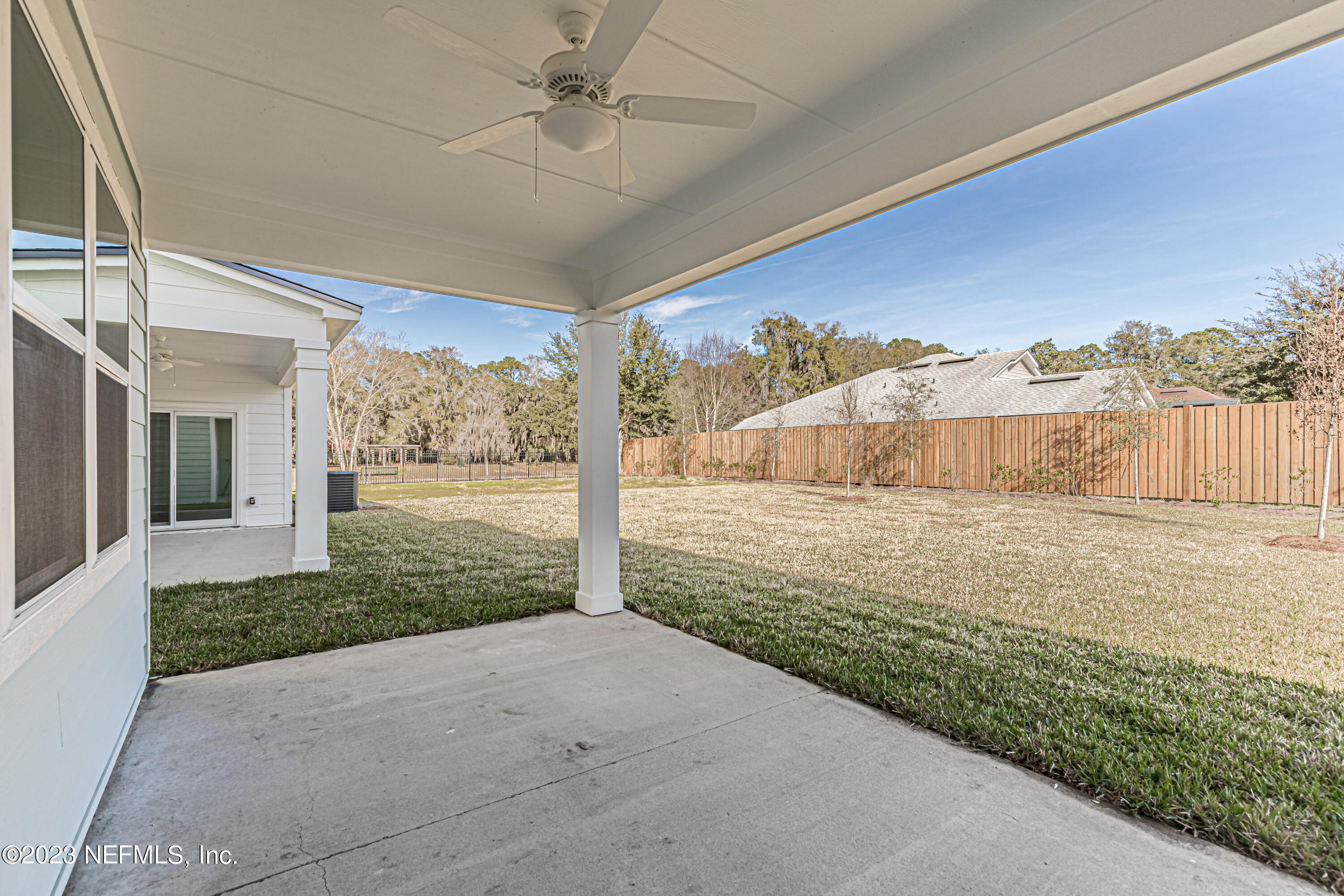 3057 Orange Picker Road Jacksonville, FL 32223 - Photo 19 of 21 a view of a house with backyard and porch