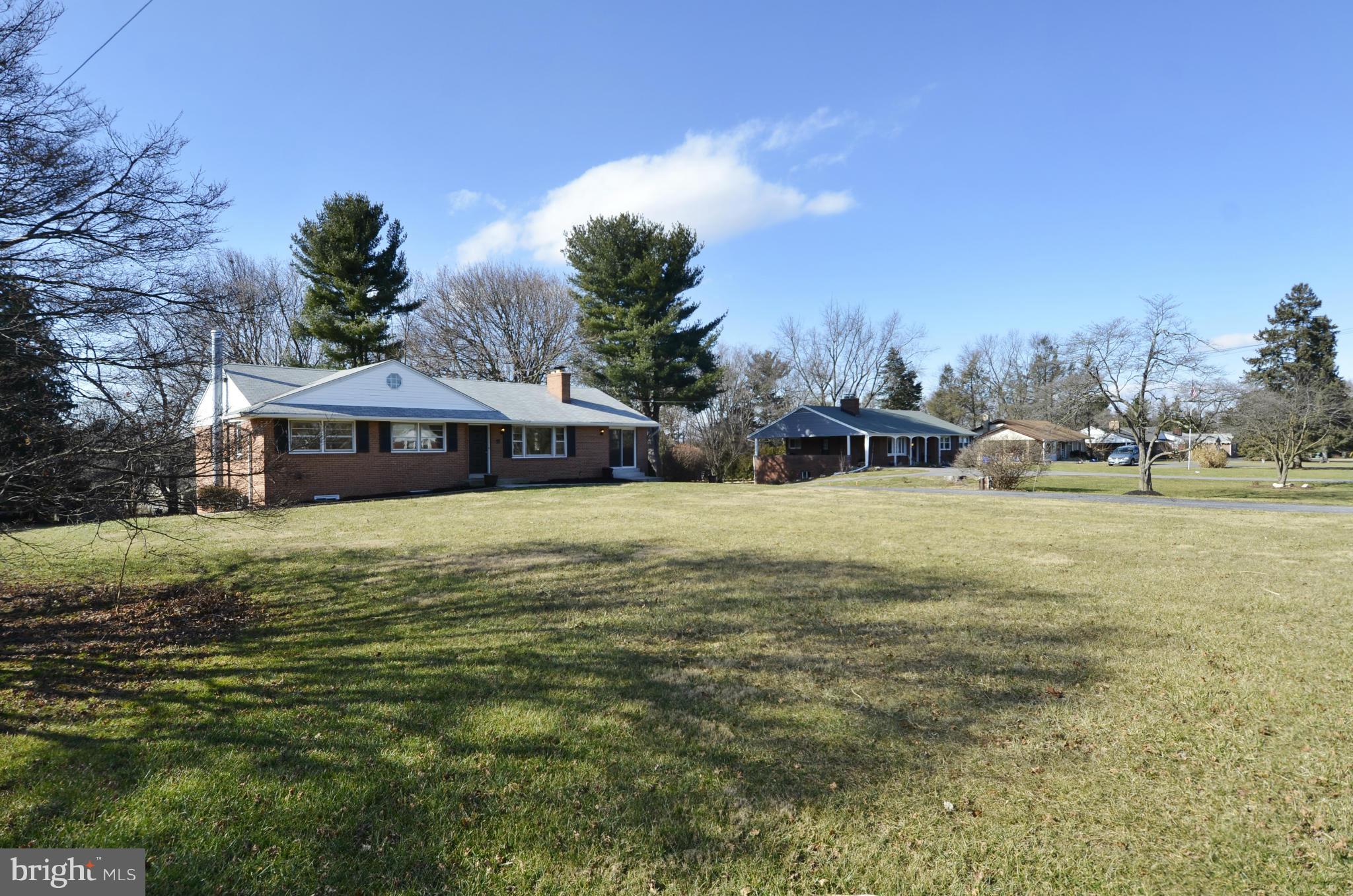 28608 Kemptown Road Damascus, MD 20872 - Photo 2 of 30 a view of a house with a yard