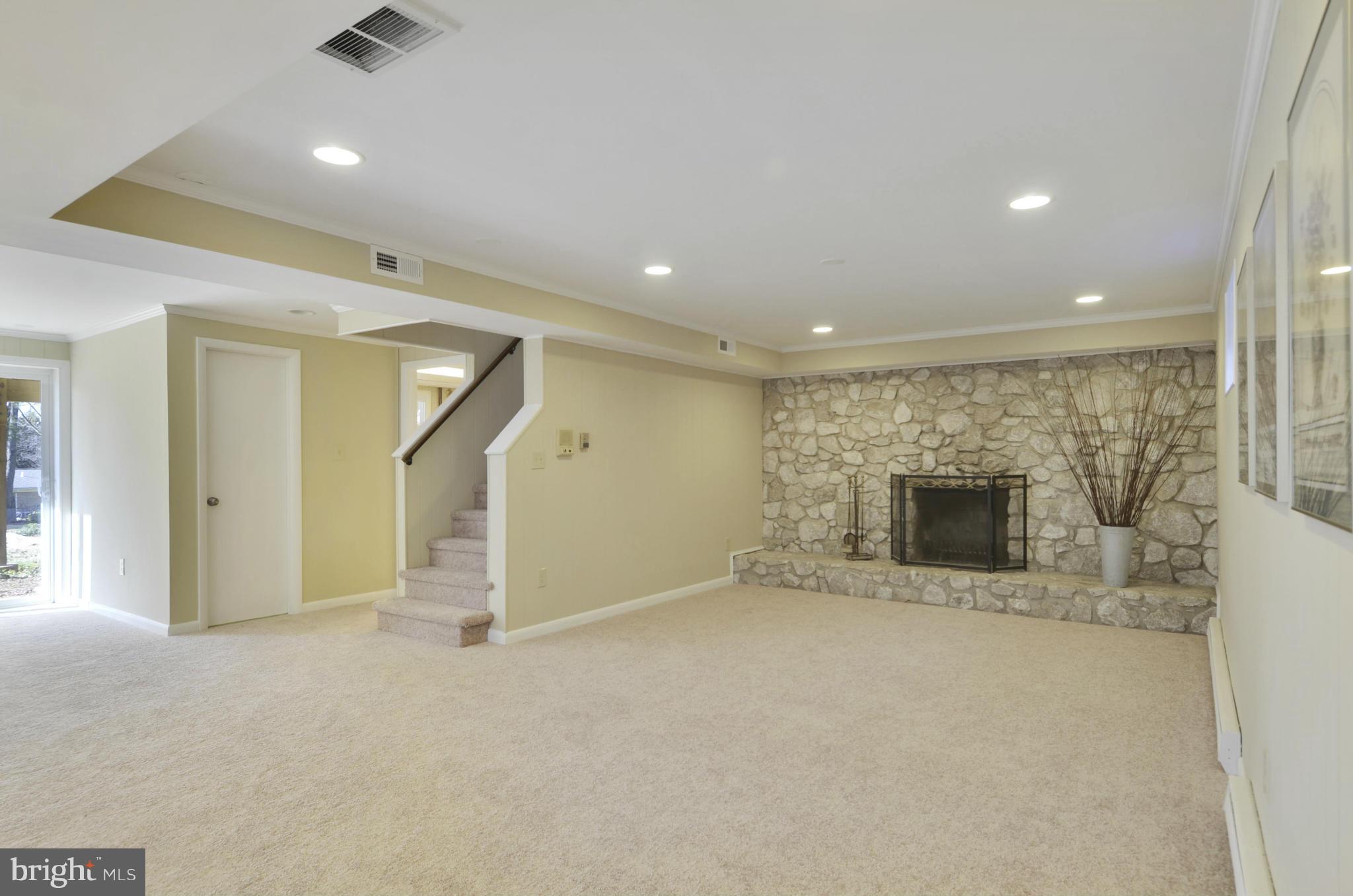 28608 Kemptown Road Damascus, MD 20872 - Photo 18 of 30 a view of empty room with a fireplace