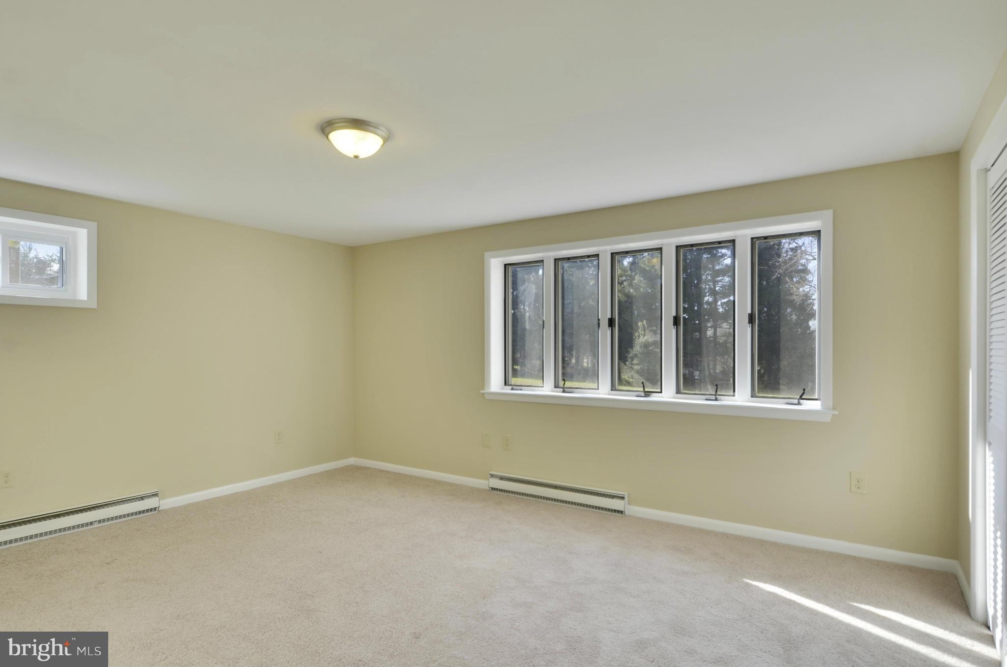 28608 Kemptown Road Damascus, MD 20872 - Photo 22 of 30 a view of an empty room with a window