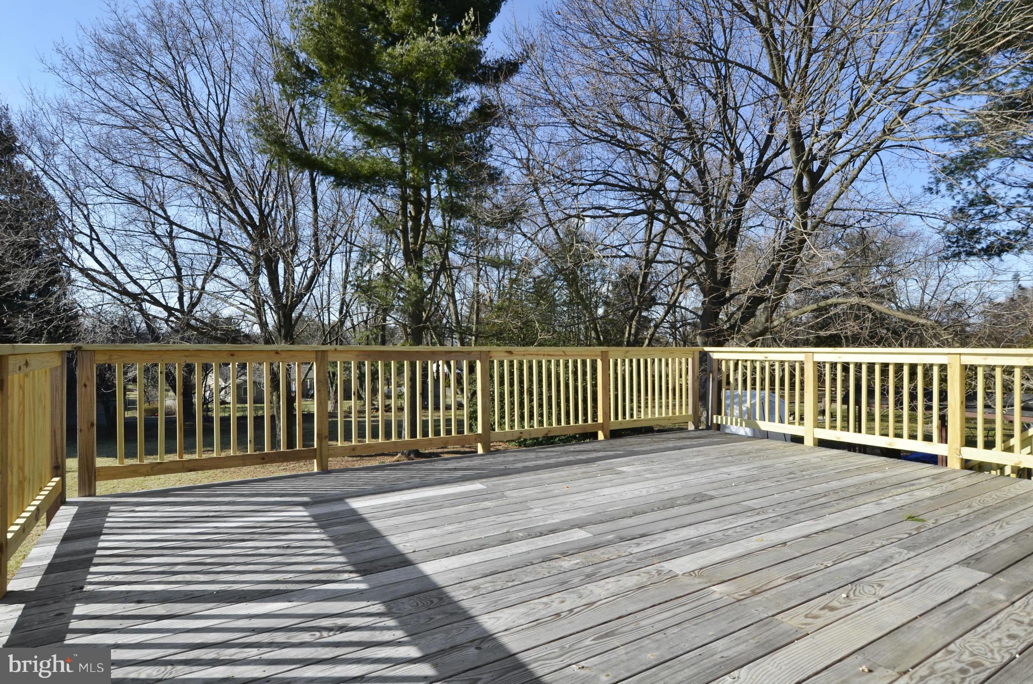 28608 Kemptown Road Damascus, MD 20872 - Photo 26 of 30 a view of a wooden deck