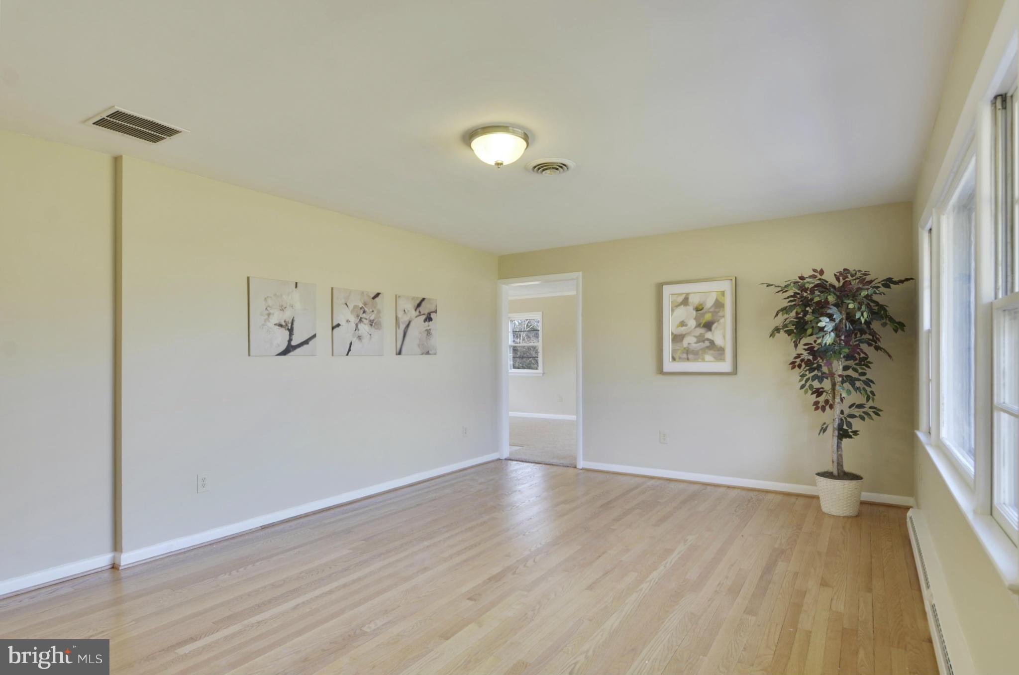 28608 Kemptown Road Damascus, MD 20872 - Photo 4 of 30 a view of an empty room with a window