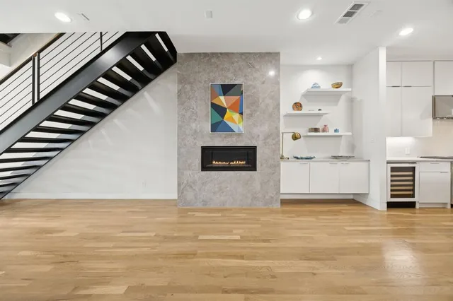 a view of kitchen with furniture and natural light