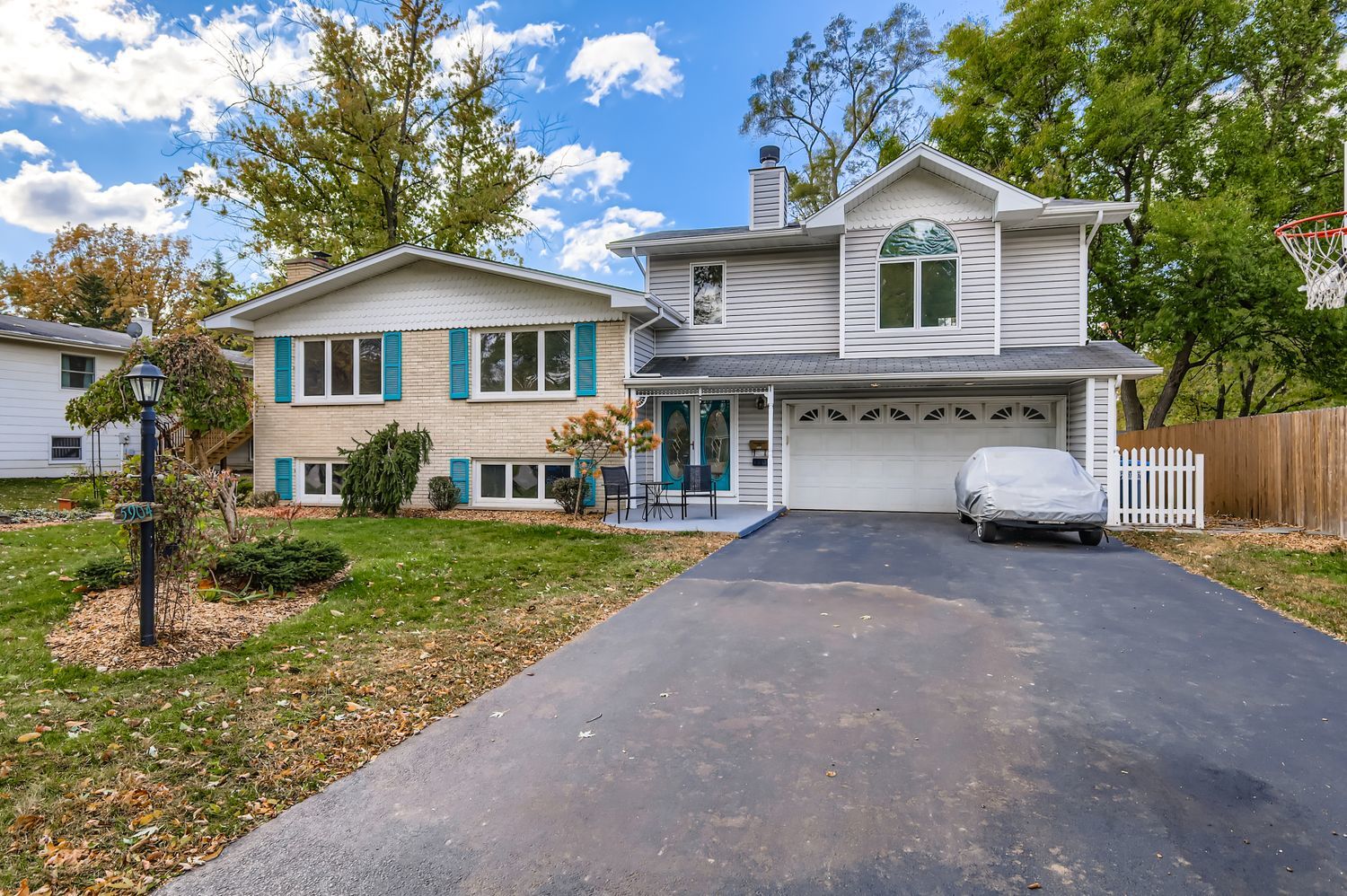 front view of a house with a yard