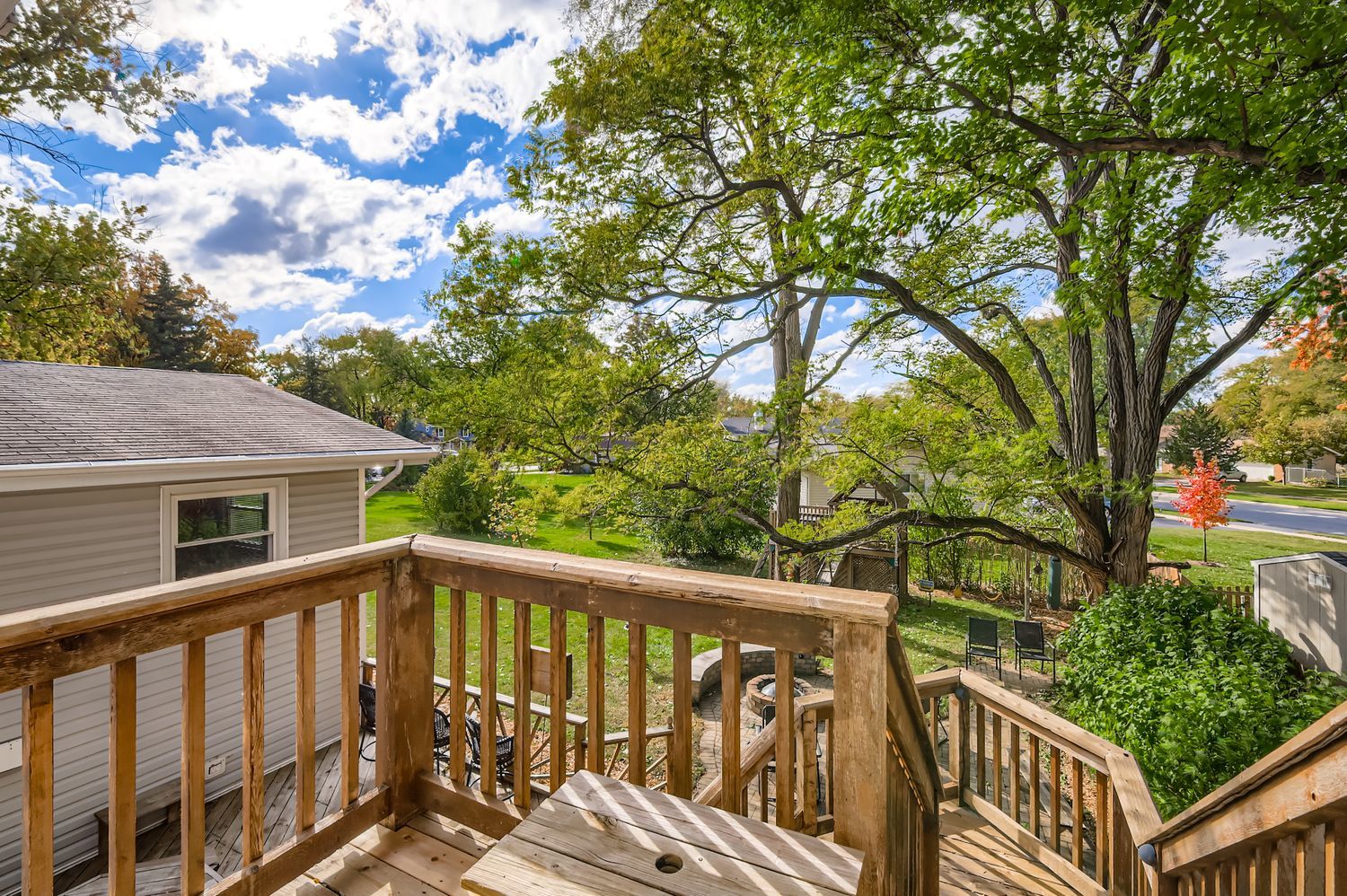 5904 Elm Street Lisle, IL 60532 - Photo 31 of 36 a view of a wooden fence and trees