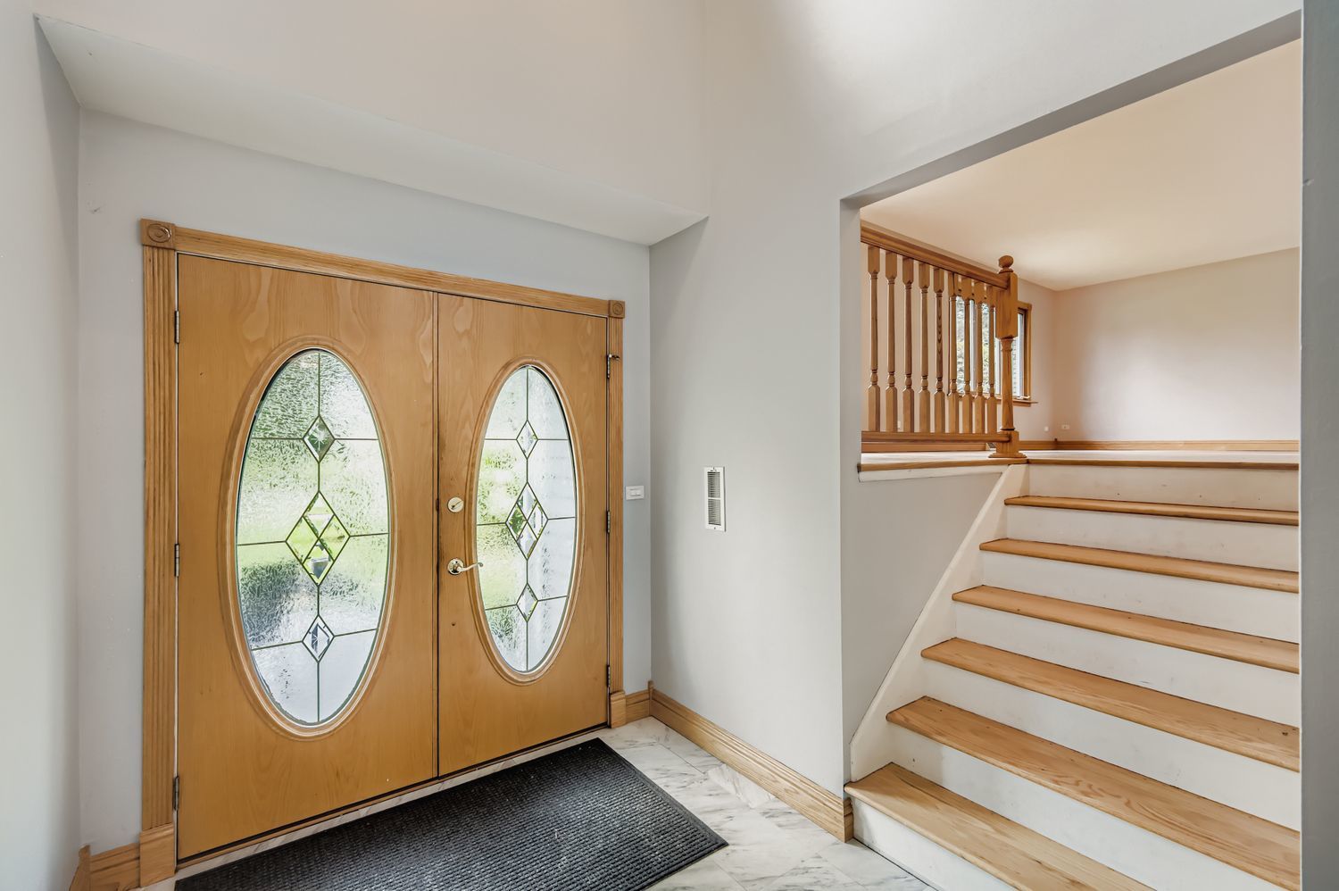 5904 Elm Street Lisle, IL 60532 - Photo 4 of 36 a view of a livingroom with wooden floor and entryway