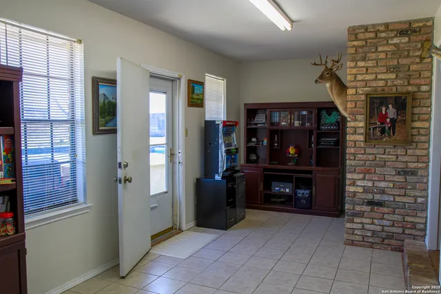 a view of an entryway with a fireplace