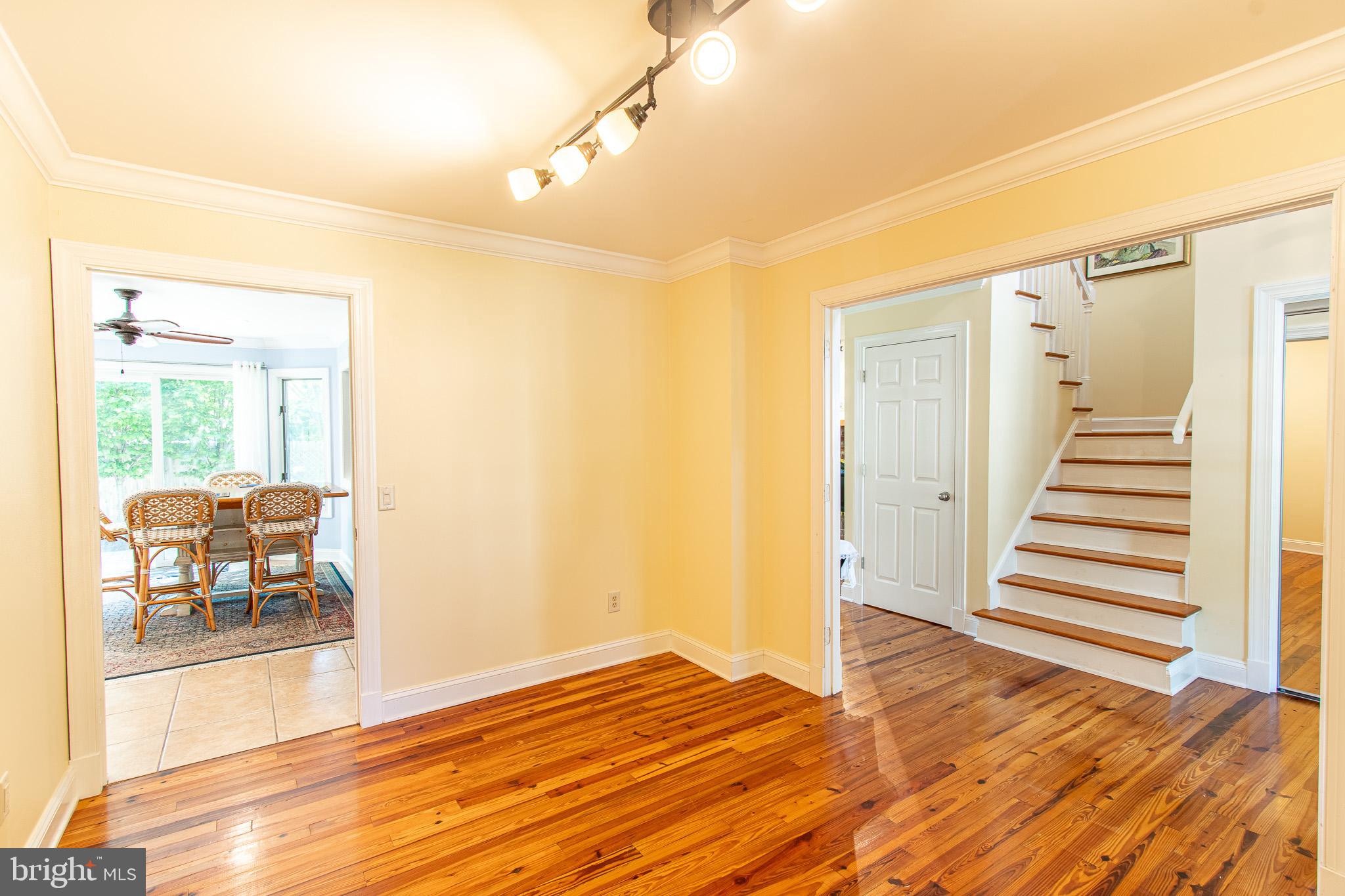 102 Jacks Point Road Oxford, MD 21654 - Photo 13 of 83 a view of a room with wooden floor and furniture