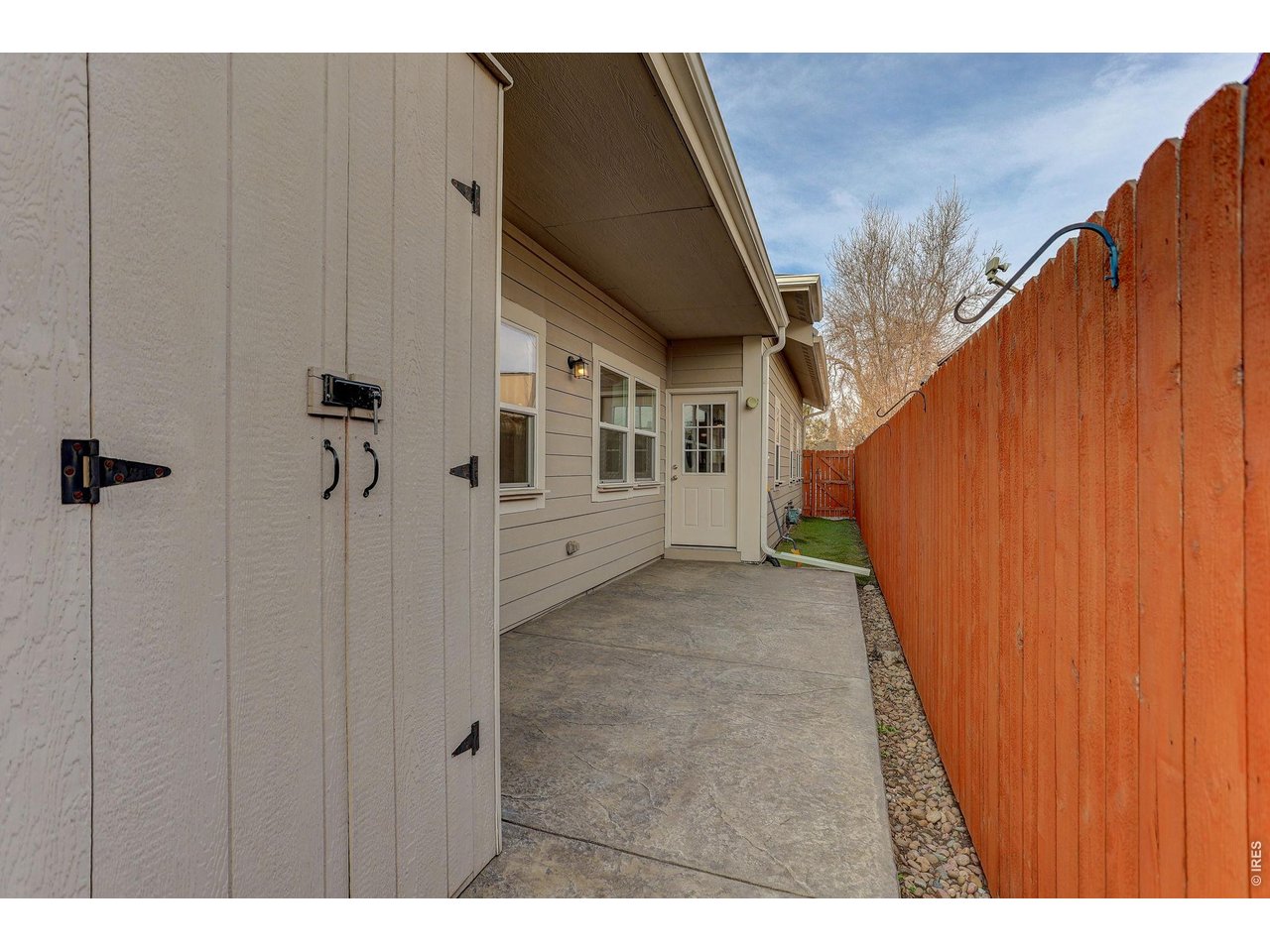 326 South Raleigh Street Denver, CO 80219 - Photo 14 of 17 Side of the home and storage shed