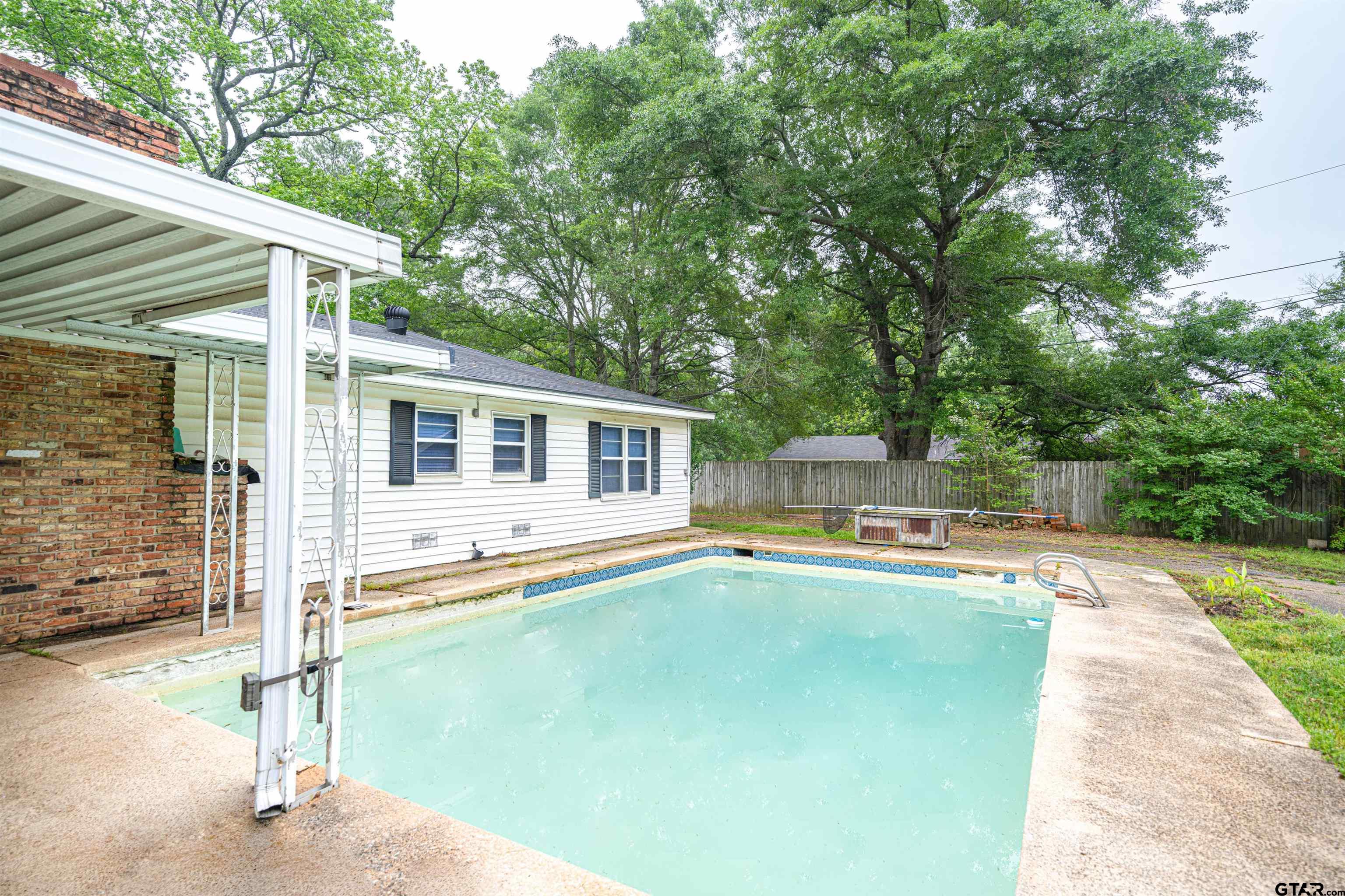 206 Summit Drive Gilmer, TX 75644 - Photo 16 of 24 a view of a house with pool