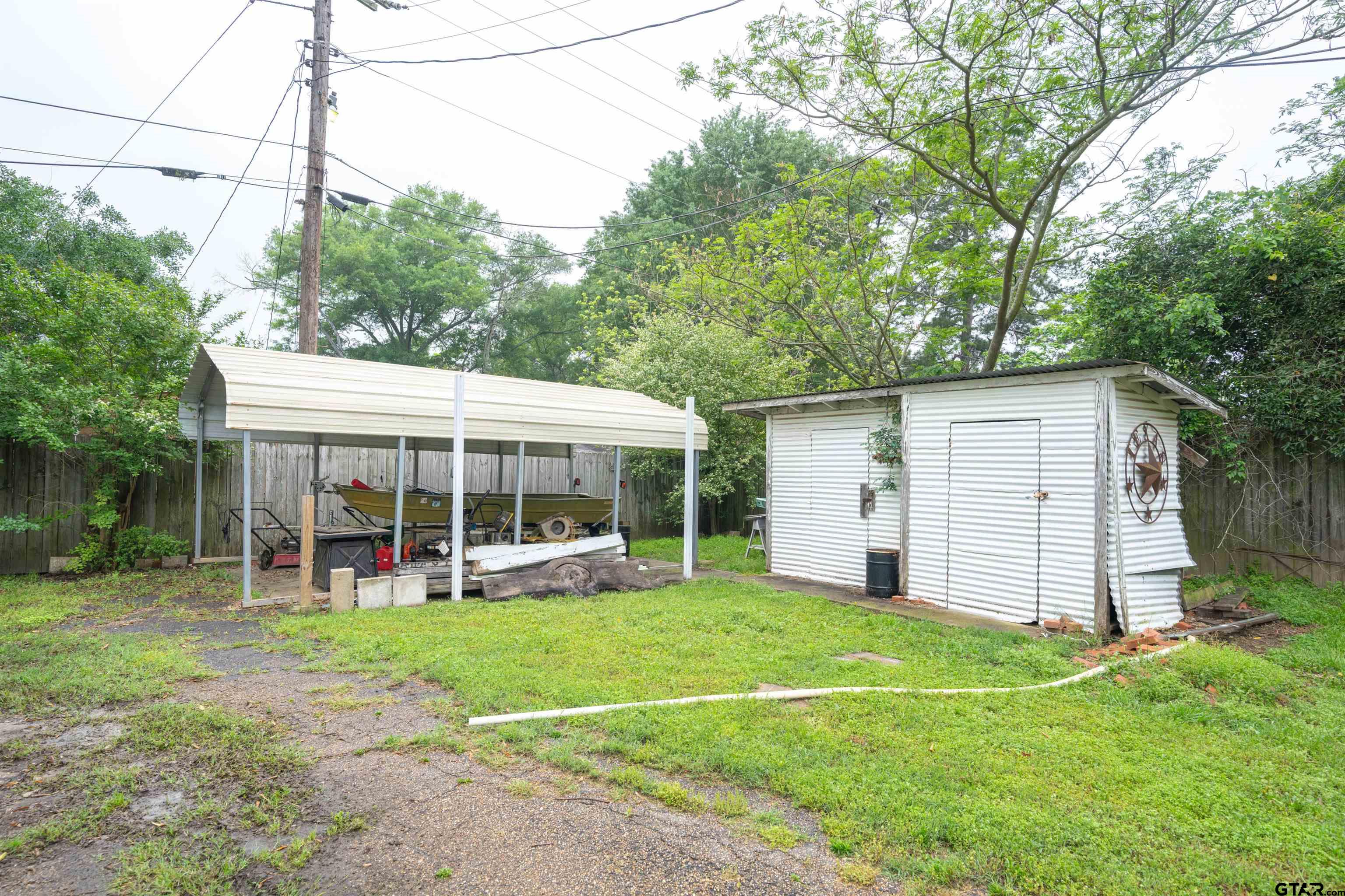 206 Summit Drive Gilmer, TX 75644 - Photo 19 of 24 a view of a house with yard and porch