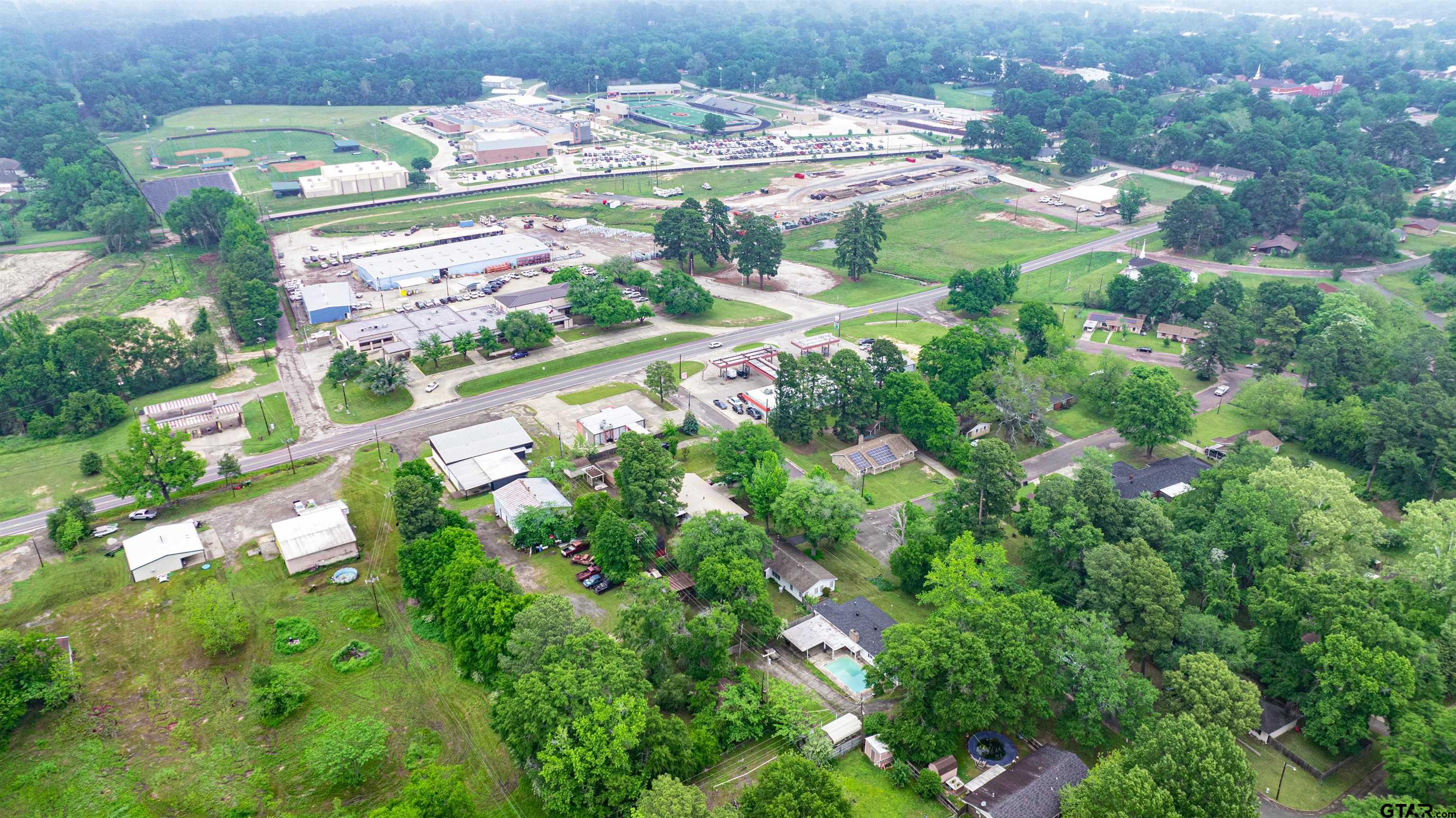 206 Summit Drive Gilmer, TX 75644 - Photo 23 of 24 an aerial view of a residential houses with yard