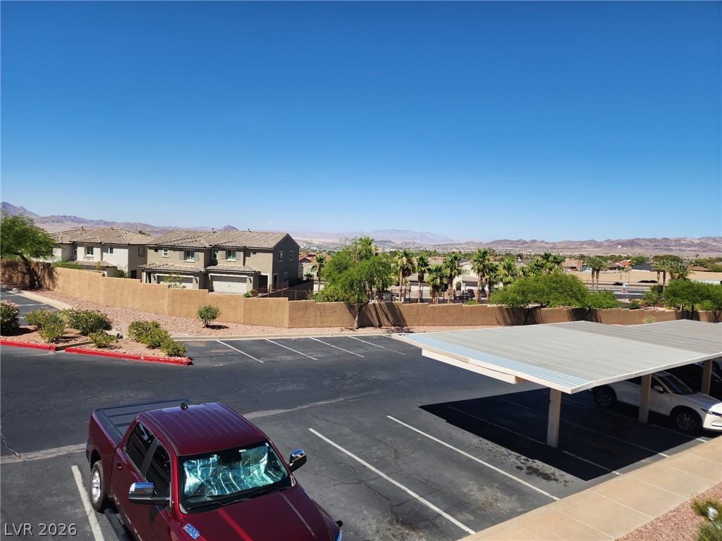 231 West Horizon Ridge Parkway, Unit 1127 Henderson, NV 89012 - Photo 34 of 39 Panoramic mountain vistas frame this inviting community with ample parking solutions.