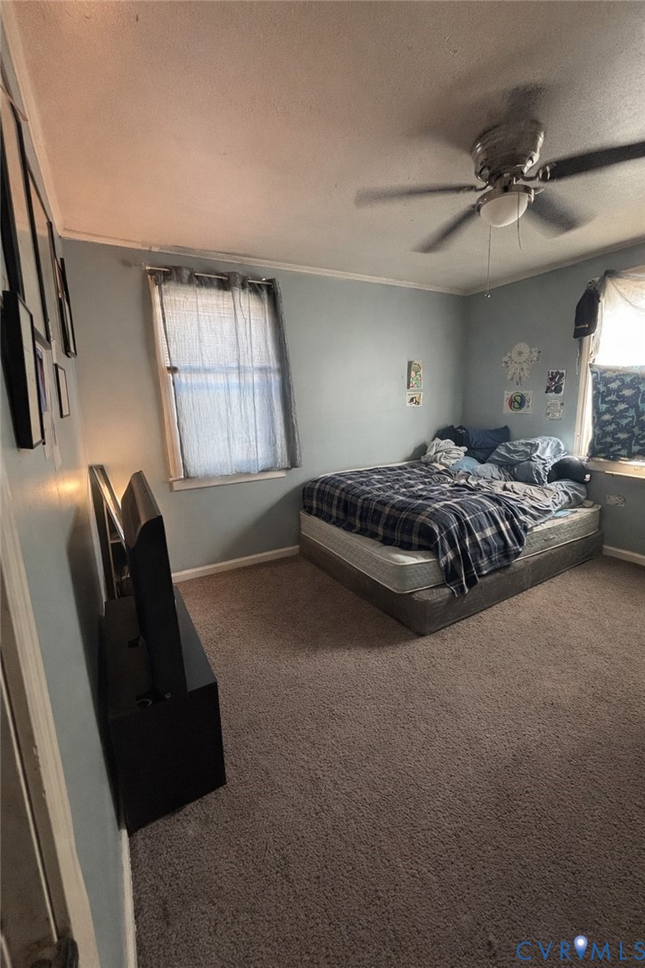 3102 Rosser Road Richmond, VA 23223 - Photo 5 of 5 a bedroom with a bed and window
