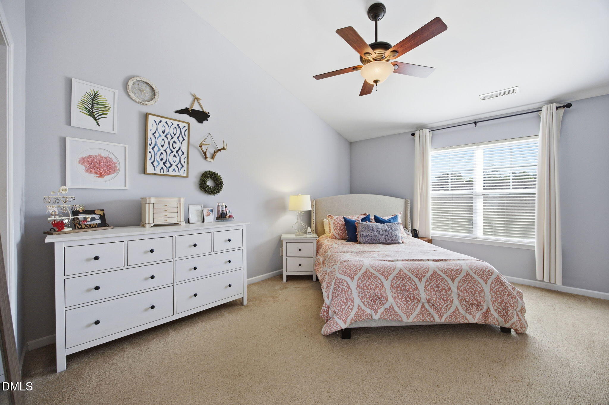 2827 Corbett Grove Drive Raleigh, NC 27616 - Photo 20 of 49 a bedroom with a bed and a large bed dresser