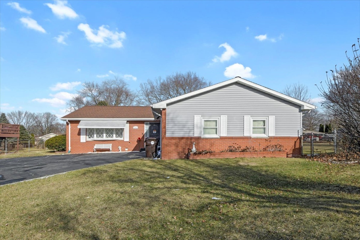 275 Alexander Drive Rantoul, IL 61866 - Photo 2 of 24 a view of house with yard and green space