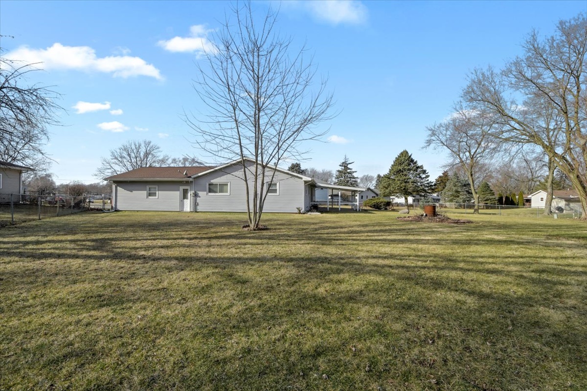 275 Alexander Drive Rantoul, IL 61866 - Photo 23 of 24 a front view of a house with a yard