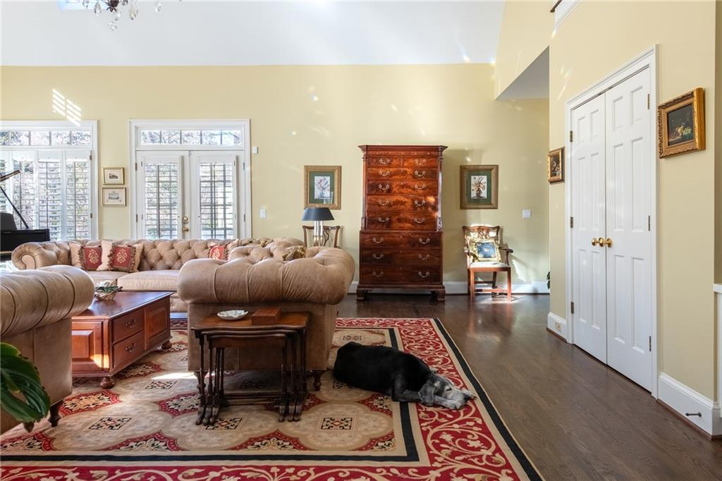 3460 Paces Valley Road Northwest Atlanta, GA 30327 - Photo 17 of 45 a living room with furniture and a rug