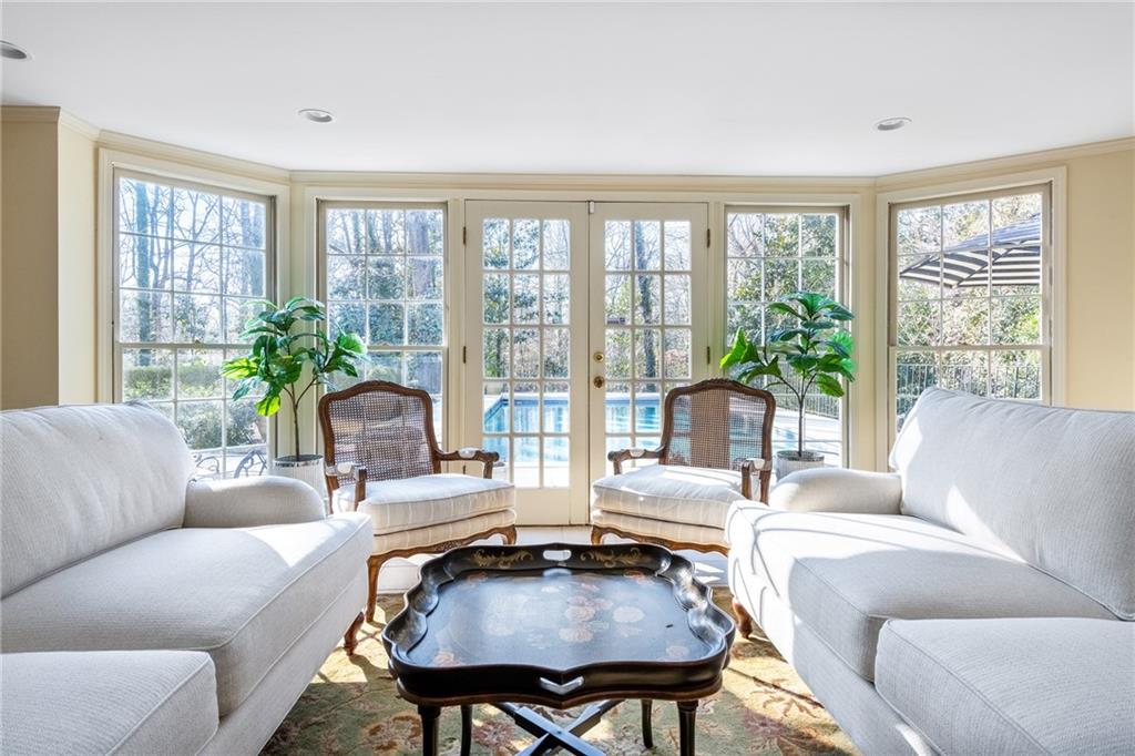 3460 Paces Valley Road Northwest Atlanta, GA 30327 - Photo 32 of 45 a living room with furniture and a large window