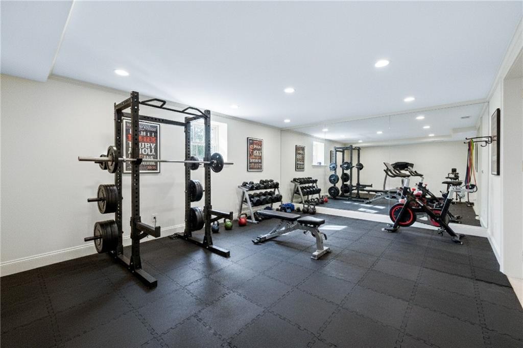3460 Paces Valley Road Northwest Atlanta, GA 30327 - Photo 34 of 45 a view of a room with gym equipment