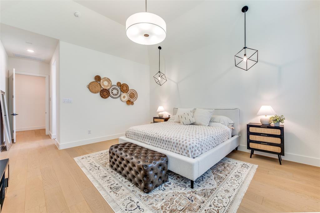 660 Neale Street Prosper, TX 75078 - Photo 17 of 40 a bedroom with a bed and dresser