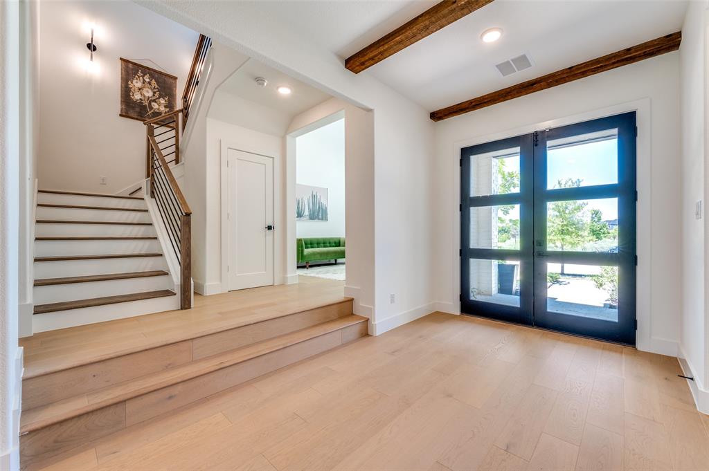 660 Neale Street Prosper, TX 75078 - Photo 2 of 40 a view of empty room with stairs