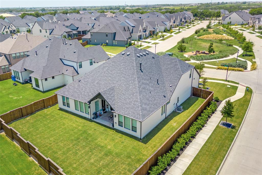 660 Neale Street Prosper, TX 75078 - Photo 36 of 40 an aerial view of a house with a swimming pool
