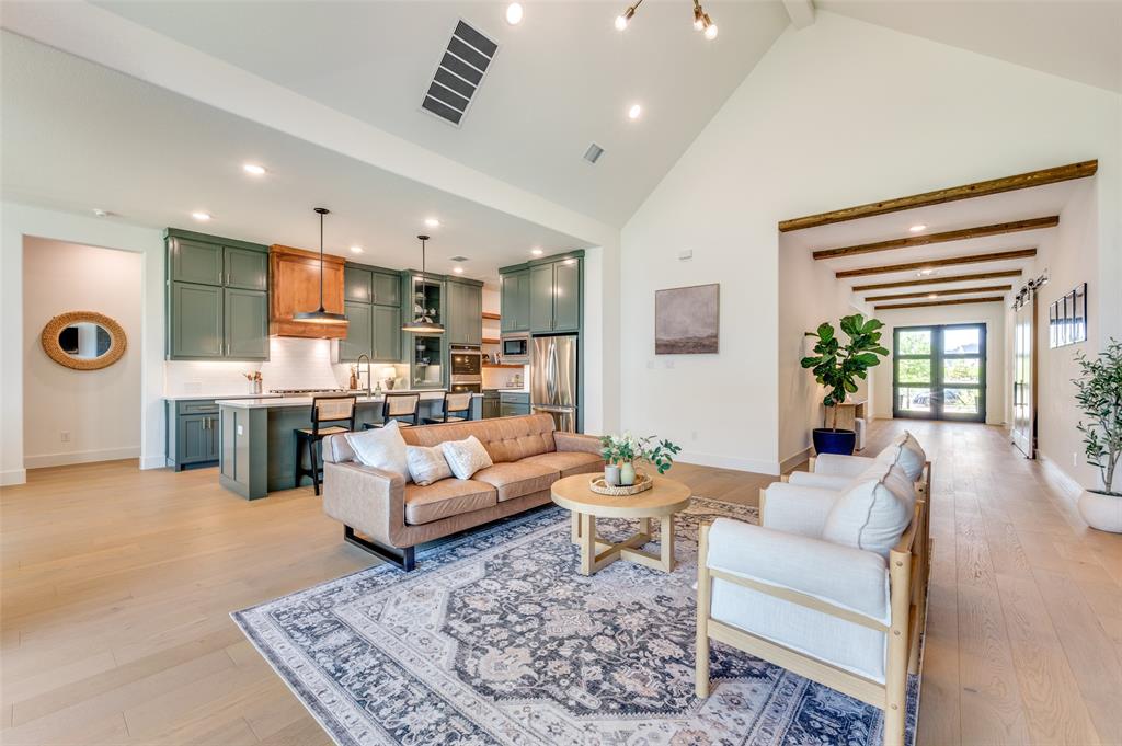 660 Neale Street Prosper, TX 75078 - Photo 7 of 40 a living room with furniture and a large window