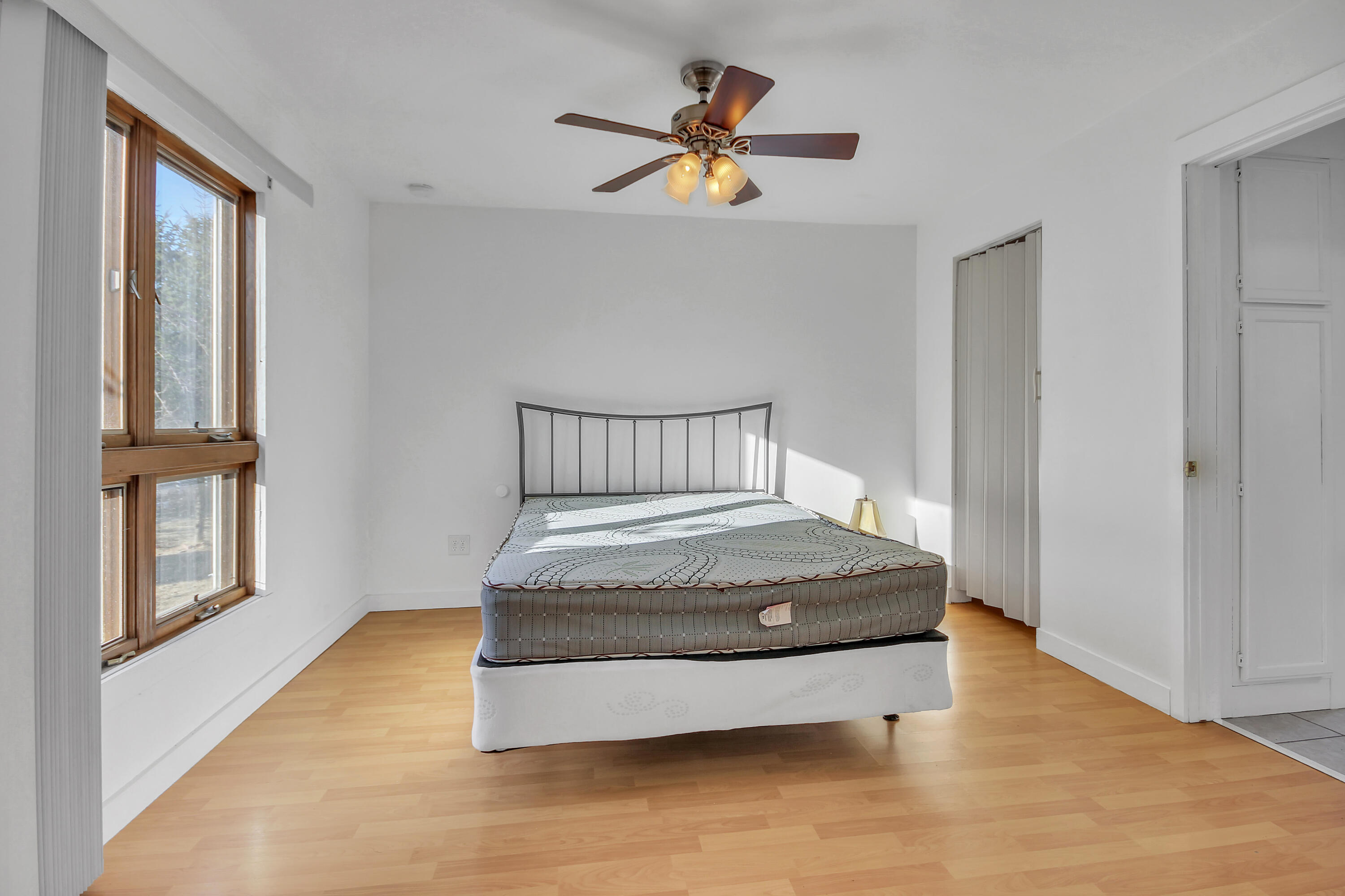 2321 Burr Street Gary, IN 46406 - Photo 14 of 29 a bedroom with a bed and window