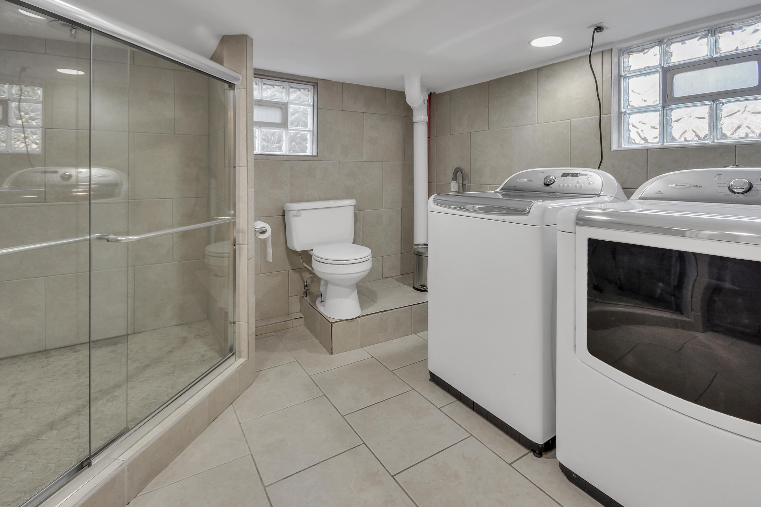 2321 Burr Street Gary, IN 46406 - Photo 18 of 29 a bathroom with a sink toilet and shower