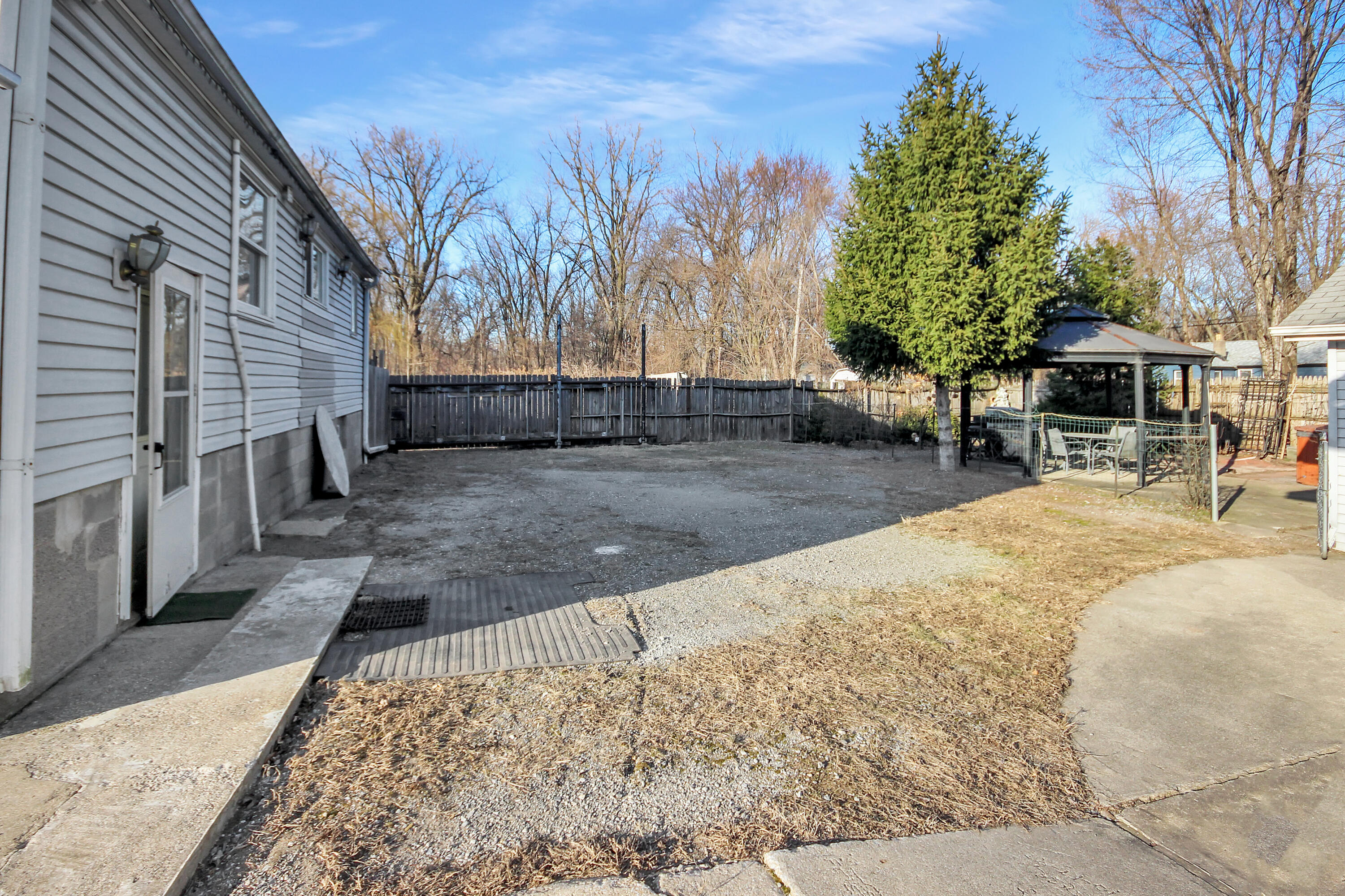 2321 Burr Street Gary, IN 46406 - Photo 25 of 29 a view of a backyard with sitting area