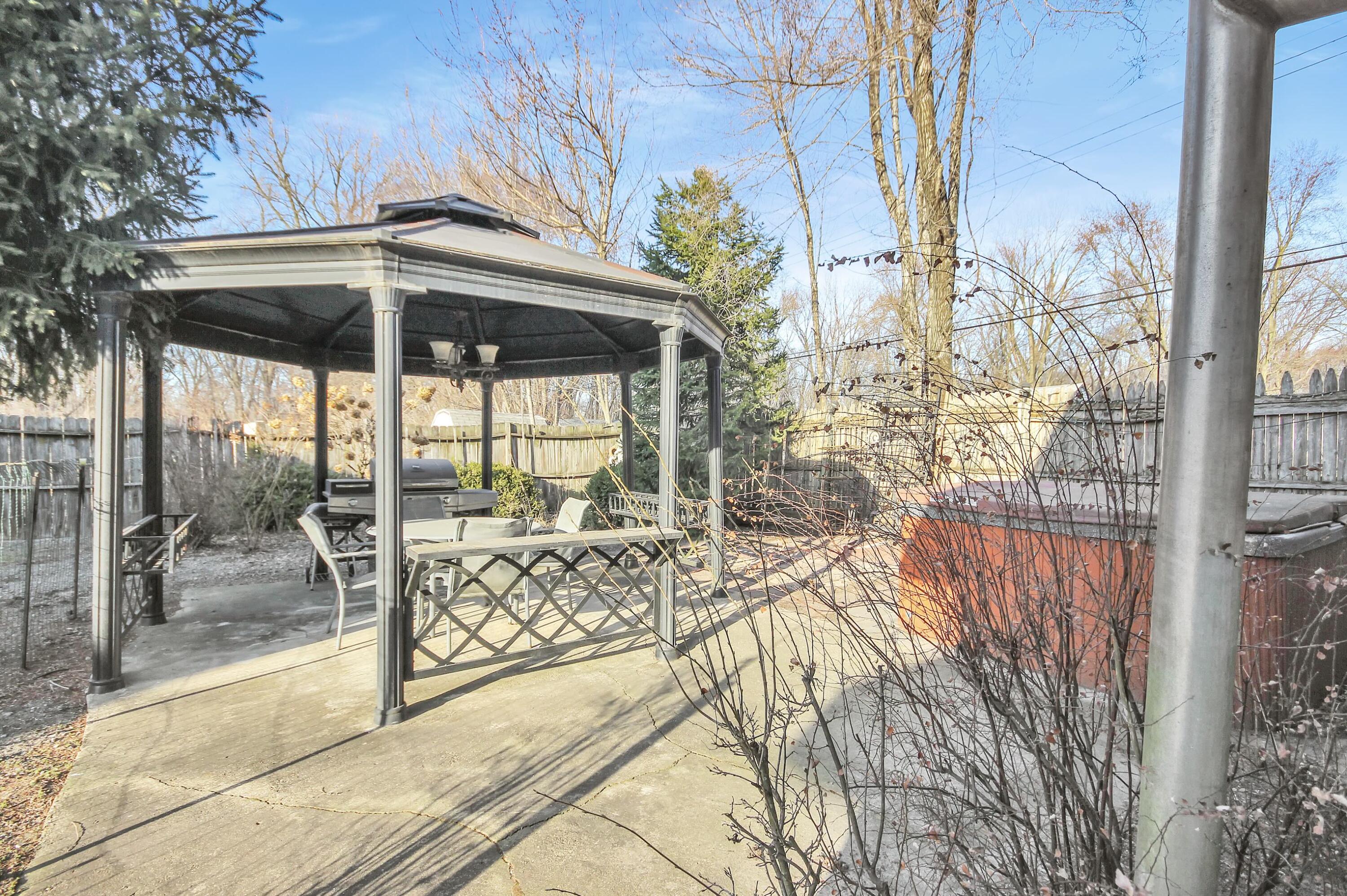 2321 Burr Street Gary, IN 46406 - Photo 29 of 29 a view of a house with a floor to ceiling window next to a yard