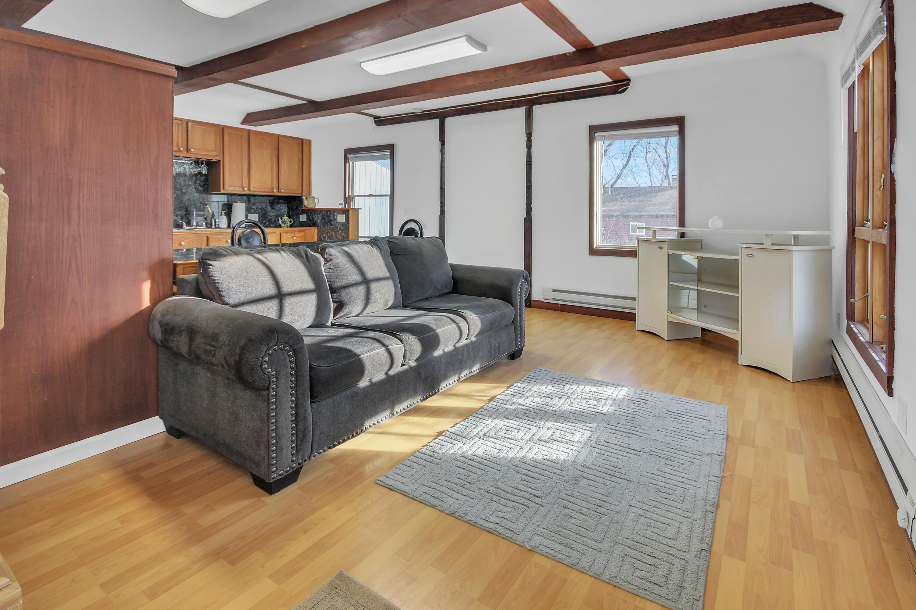 2321 Burr Street Gary, IN 46406 - Photo 6 of 29 a bedroom with furniture and a wooden floor