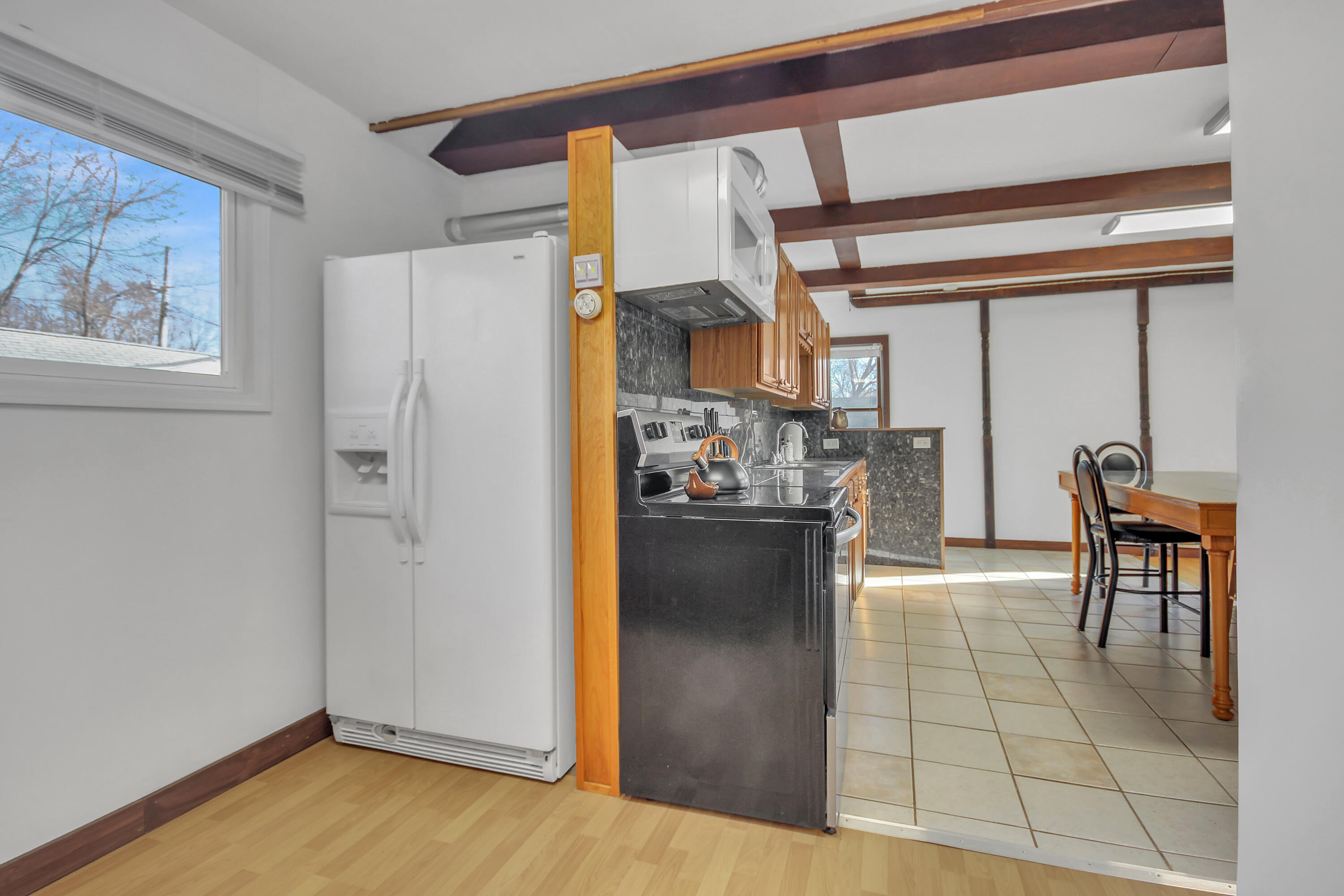 2321 Burr Street Gary, IN 46406 - Photo 9 of 29 a view of kitchen and dining room