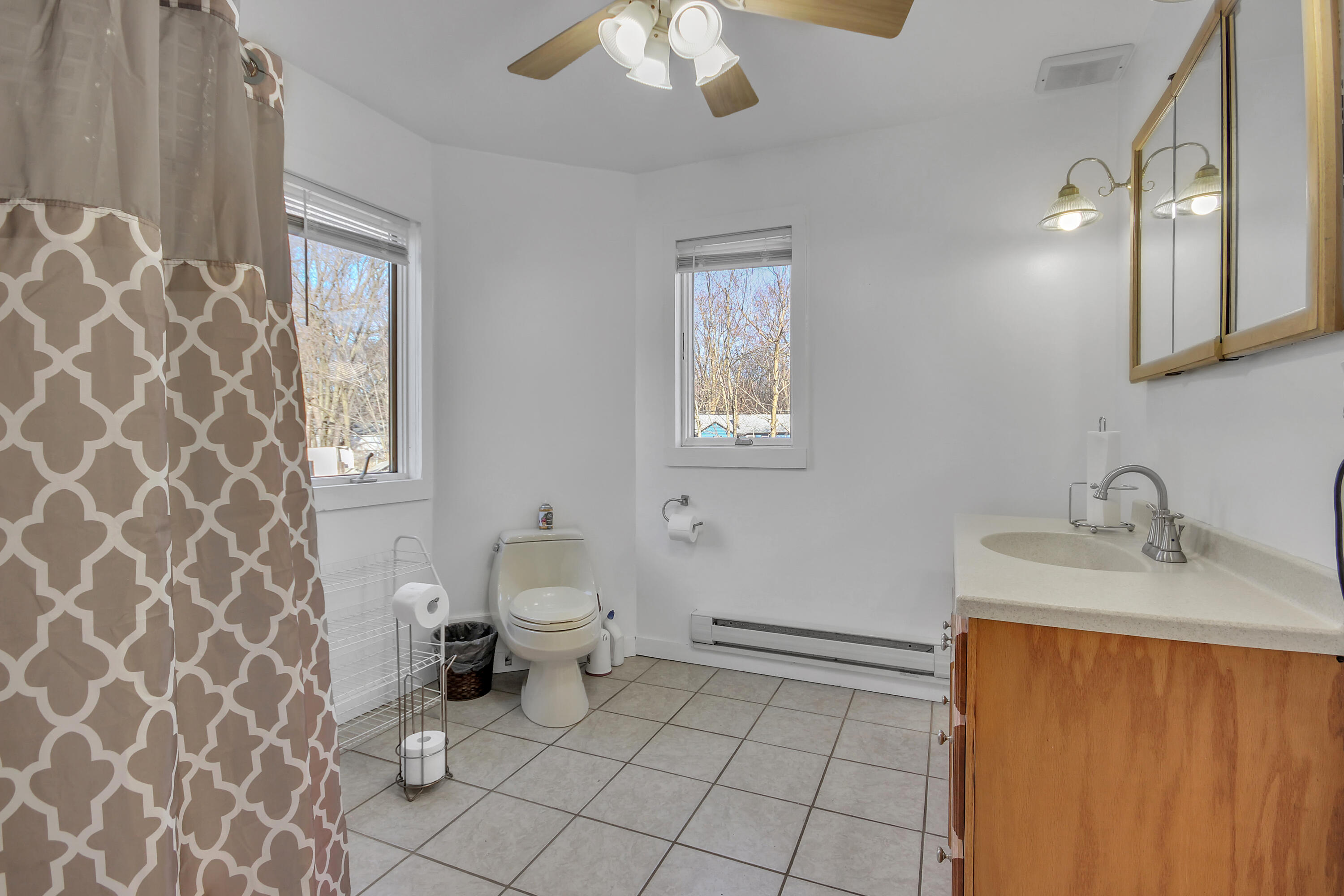 2321 Burr Street Gary, IN 46406 - Photo 10 of 29 a bathroom with a sink toilet and mirror