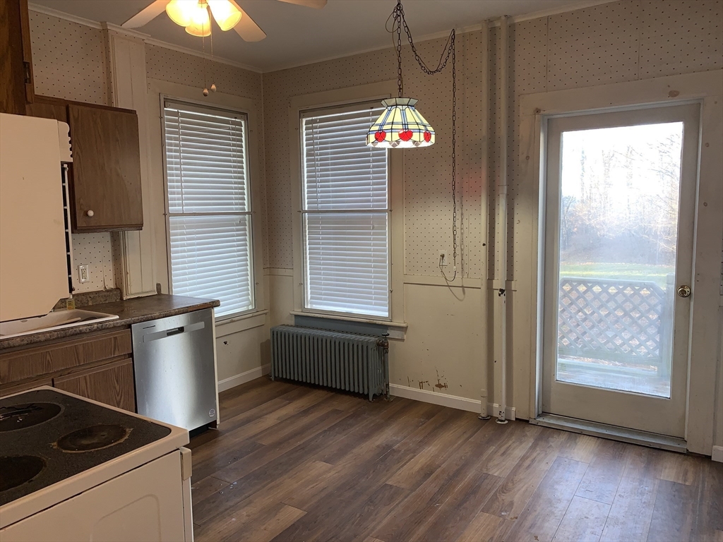 72 Green Street Athol, MA 01331 - Photo 14 of 36 a kitchen with a refrigerator and wooden floor