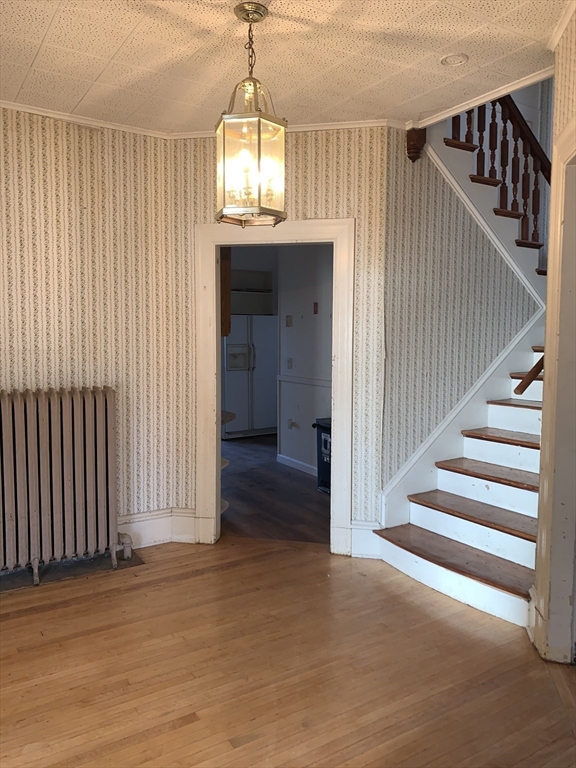 72 Green Street Athol, MA 01331 - Photo 16 of 36 wooden floor in an empty room with a window