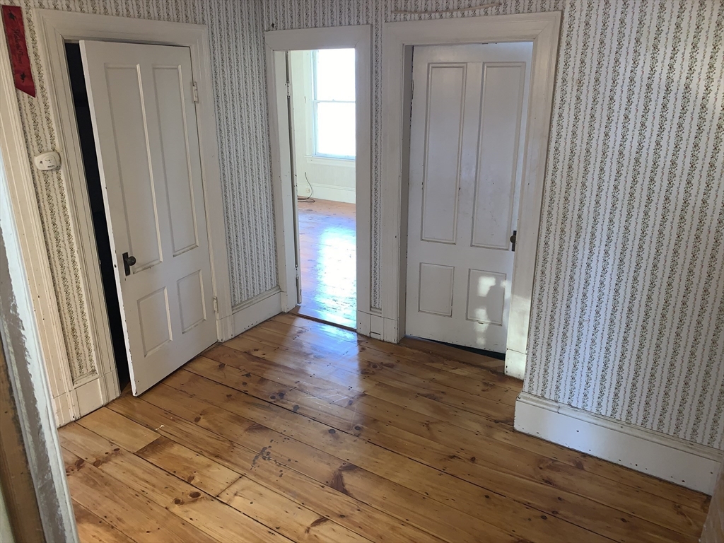 72 Green Street Athol, MA 01331 - Photo 21 of 36 a view of a hallway with wooden floor