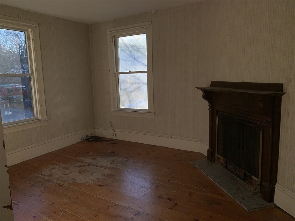 72 Green Street Athol, MA 01331 - Photo 24 of 36 an empty room with wooden floor and windows