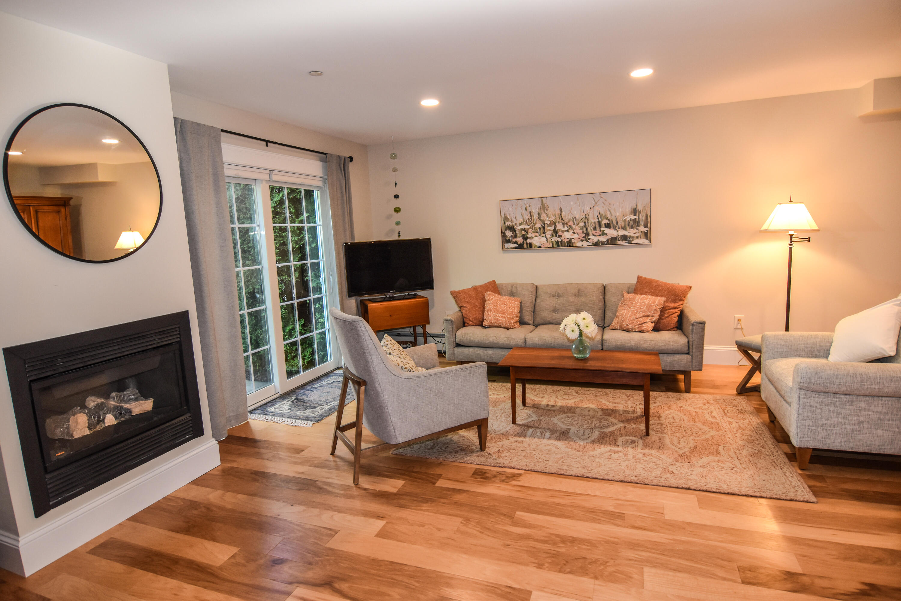 180 Ridge Road, Unit 25 Portland, ME 04103 - Photo 16 of 36 Living Room and Door to Patio