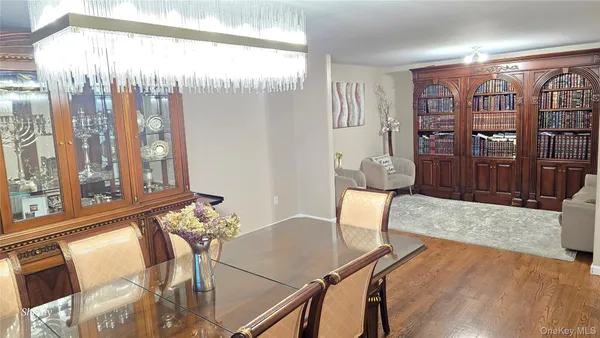 a backyard of a house with lots of green space and fountain