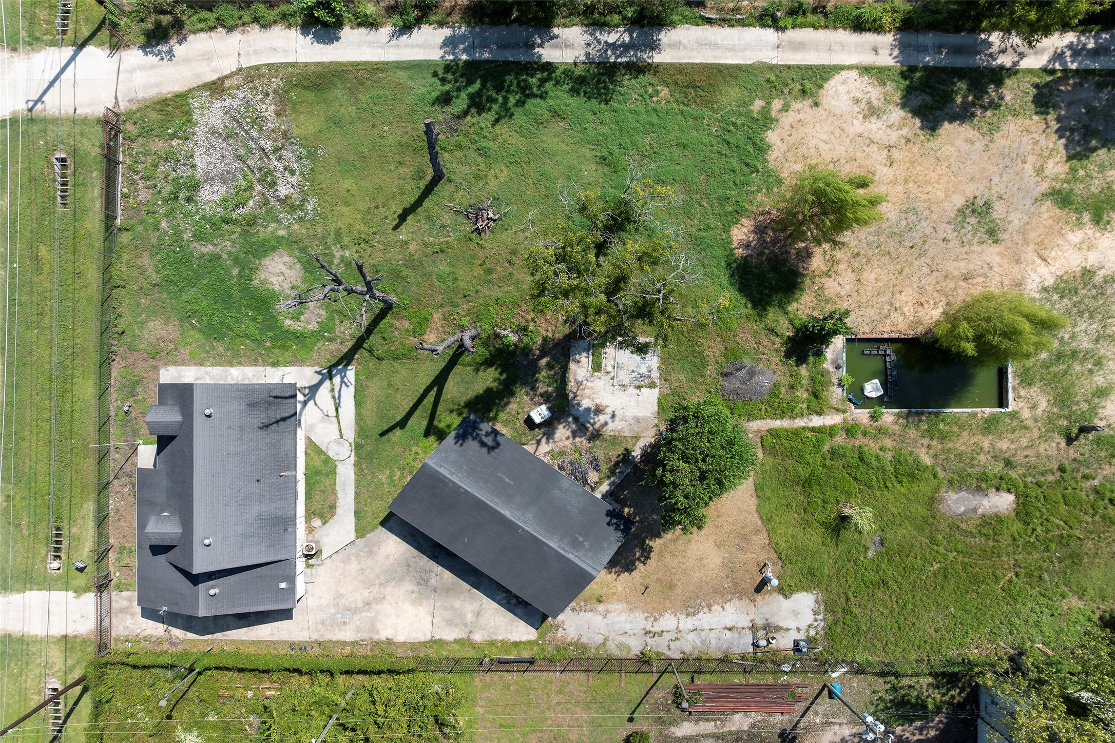 822 Aldine Mail Rte Road Houston, TX 77037 - Photo 13 of 44 an aerial view of residential houses with outdoor space