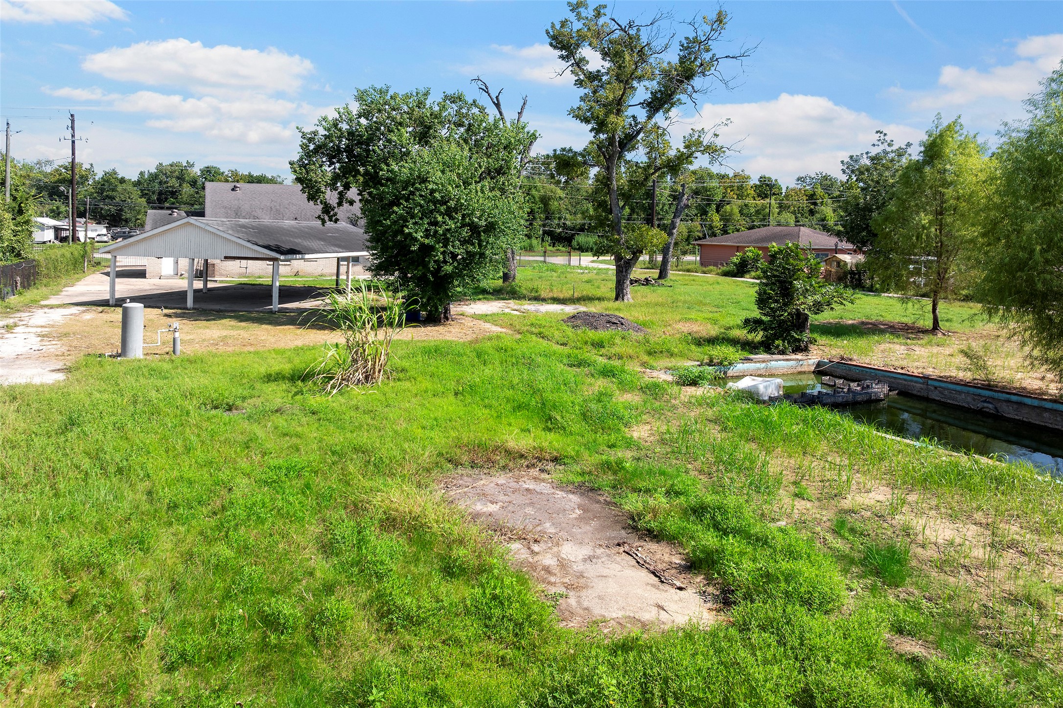 822 Aldine Mail Rte Road Houston, TX 77037 - Photo 15 of 44 a view of a park with large trees