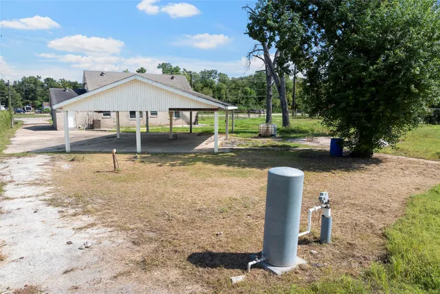 a house view with a garden space